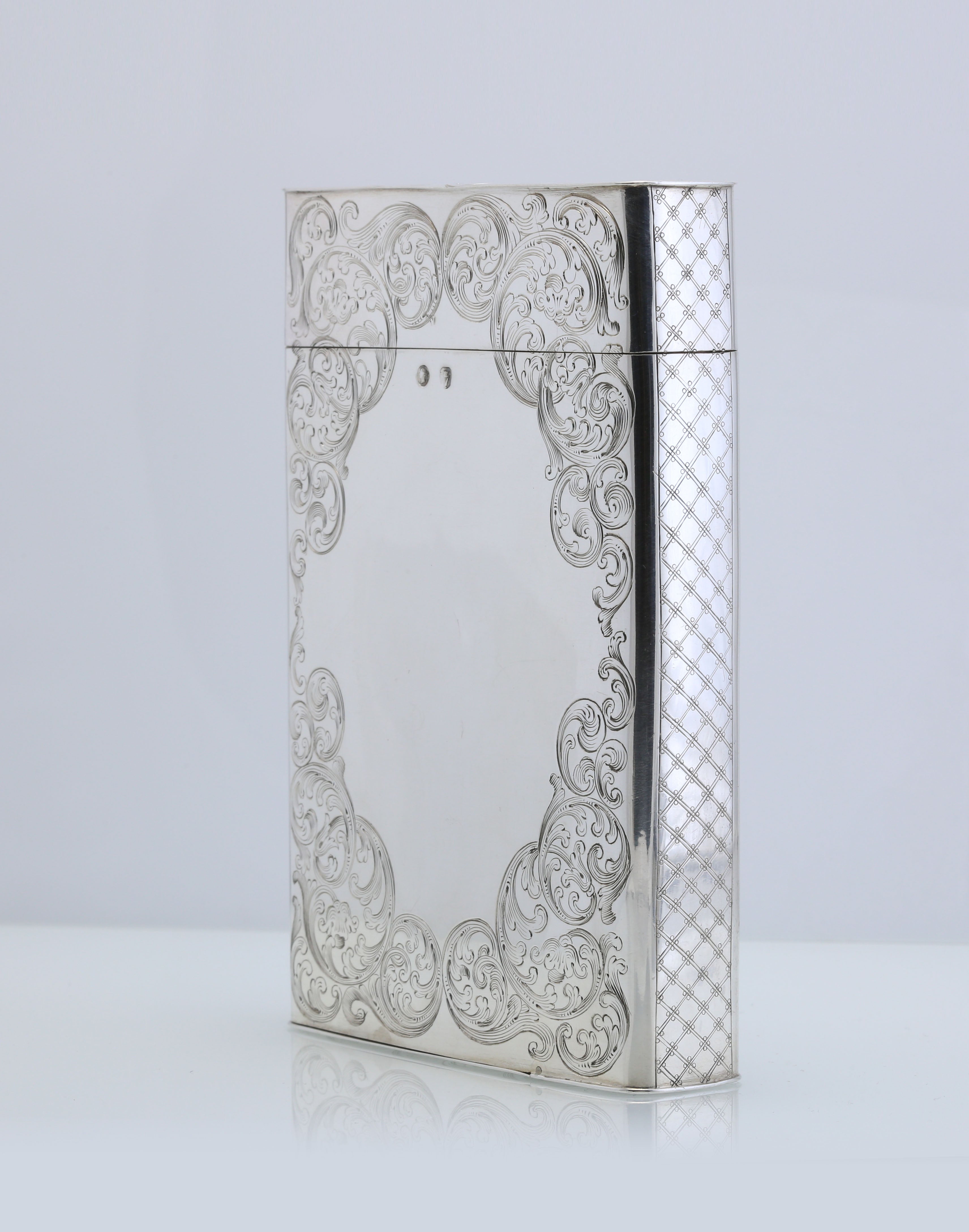 Sterling silver cigar box with engraved scrollwork, made in Dublin, England, 1867-1868.