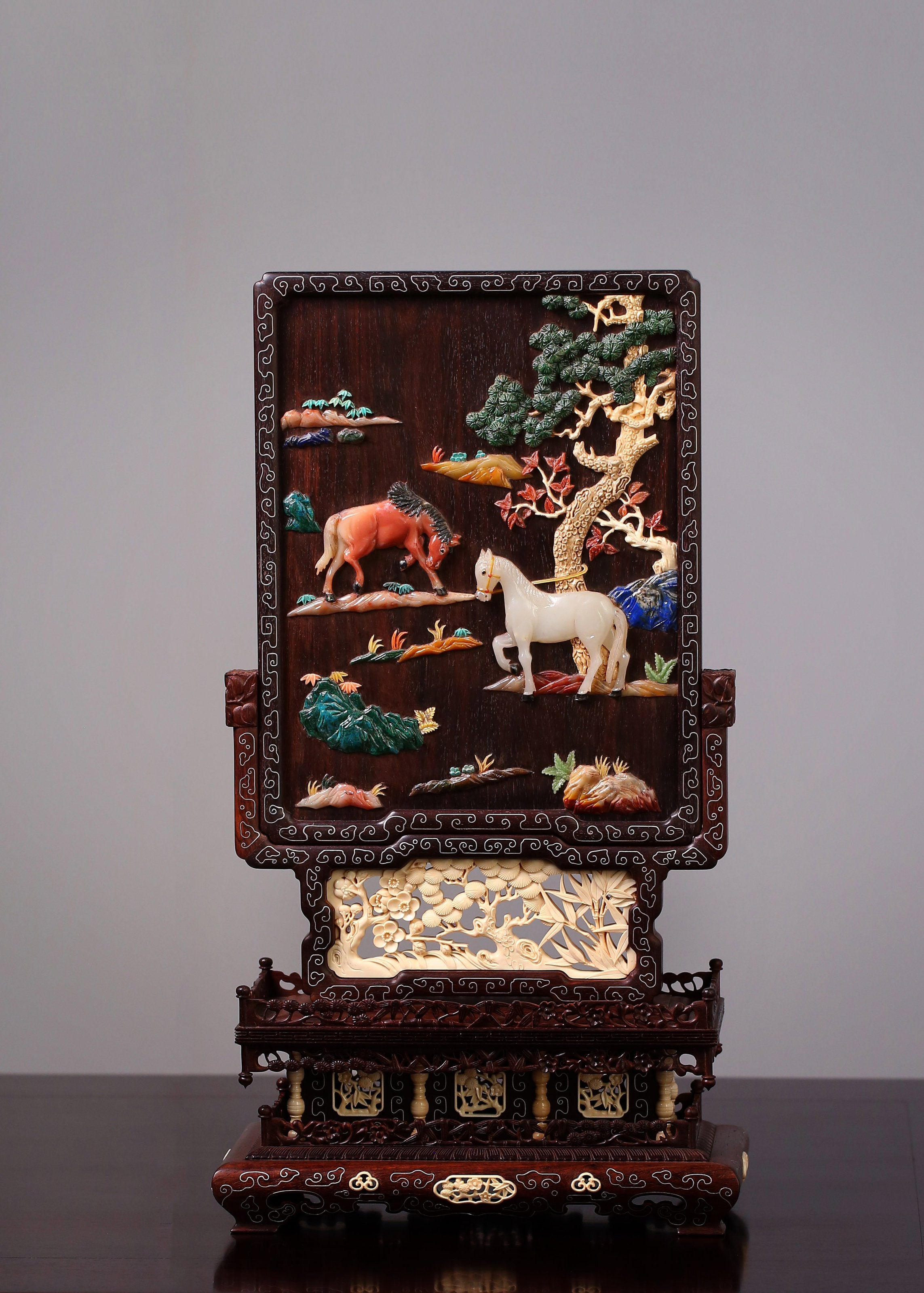 Rosewood screen inlaid with precious stones and silver filigree