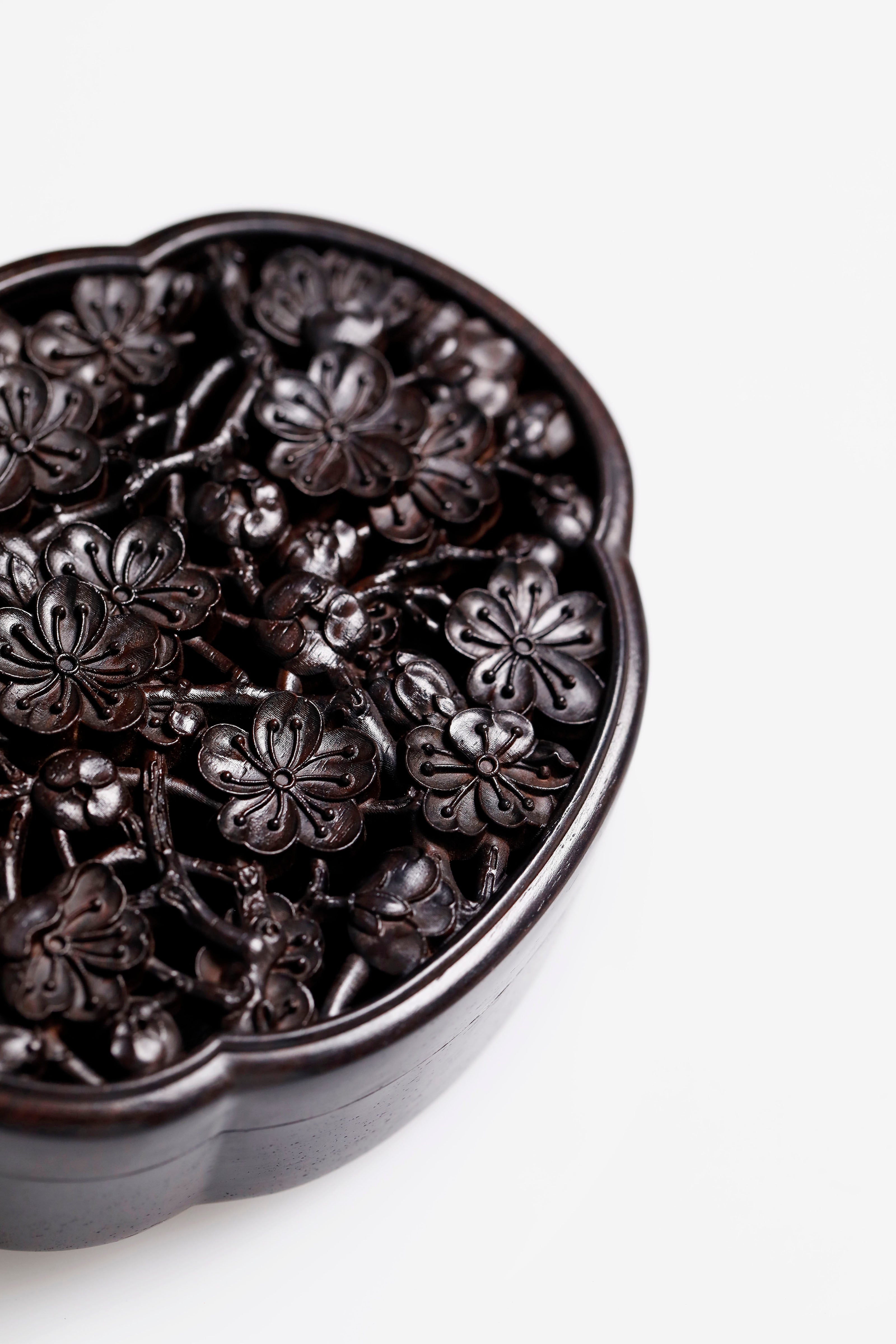 Purple sandalwood hollowed-out plum blossom shaped solid wood incense box