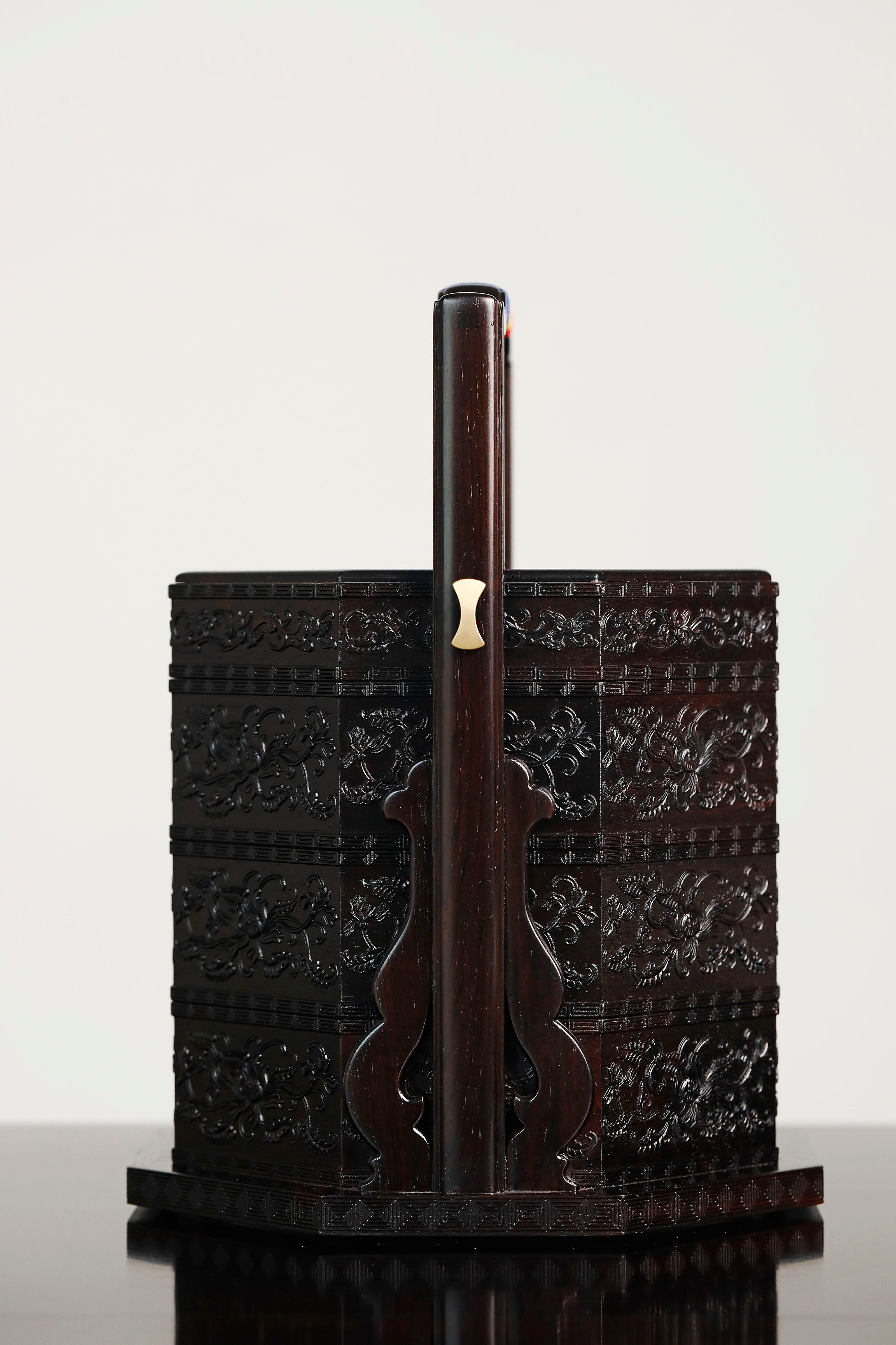 Purple sandalwood inlaid mother-of-pearl octagonal box with eight treasures