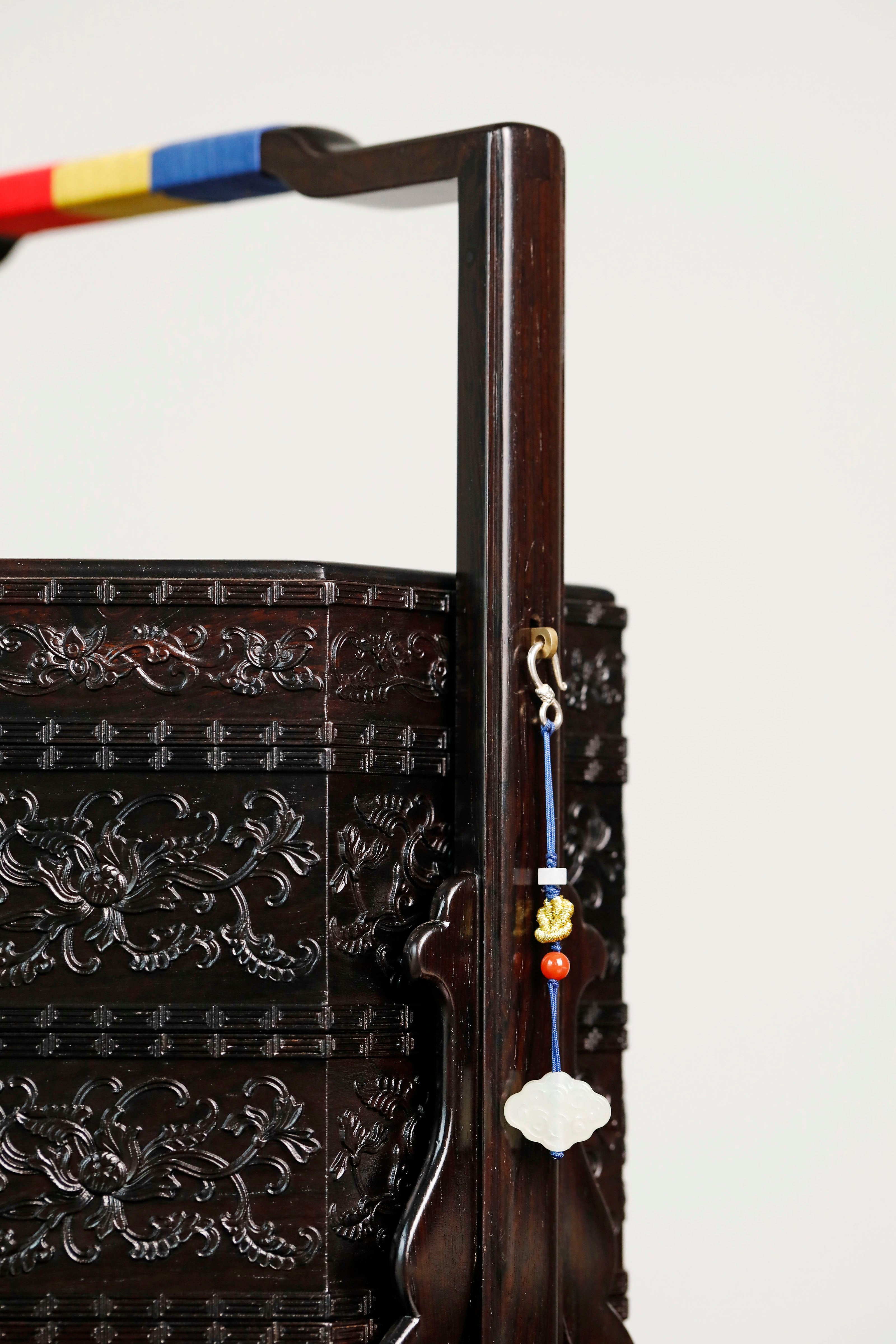 Purple sandalwood inlaid mother-of-pearl octagonal box with eight treasures