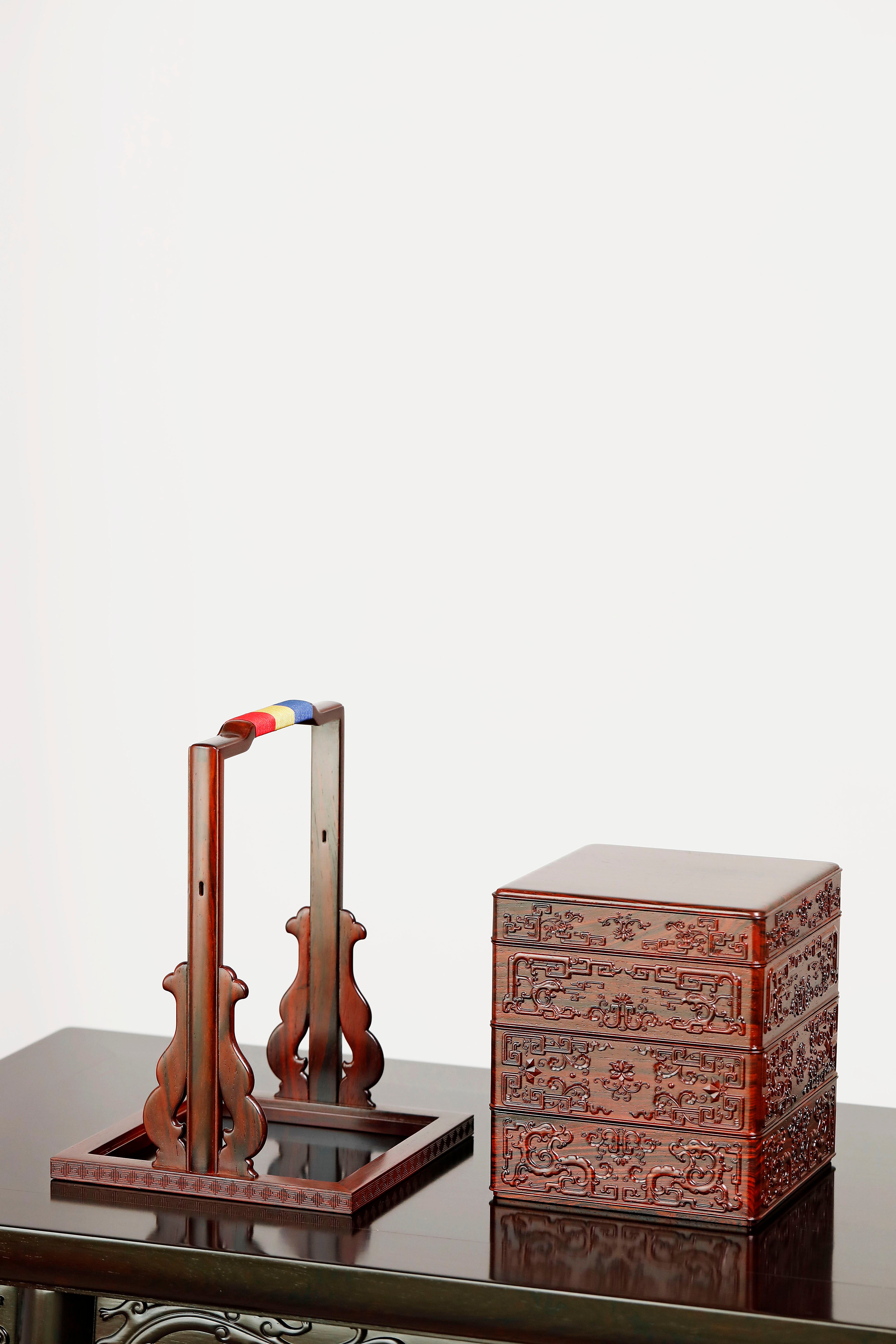 Rosewood square box with carved dragon and phoenix patterns