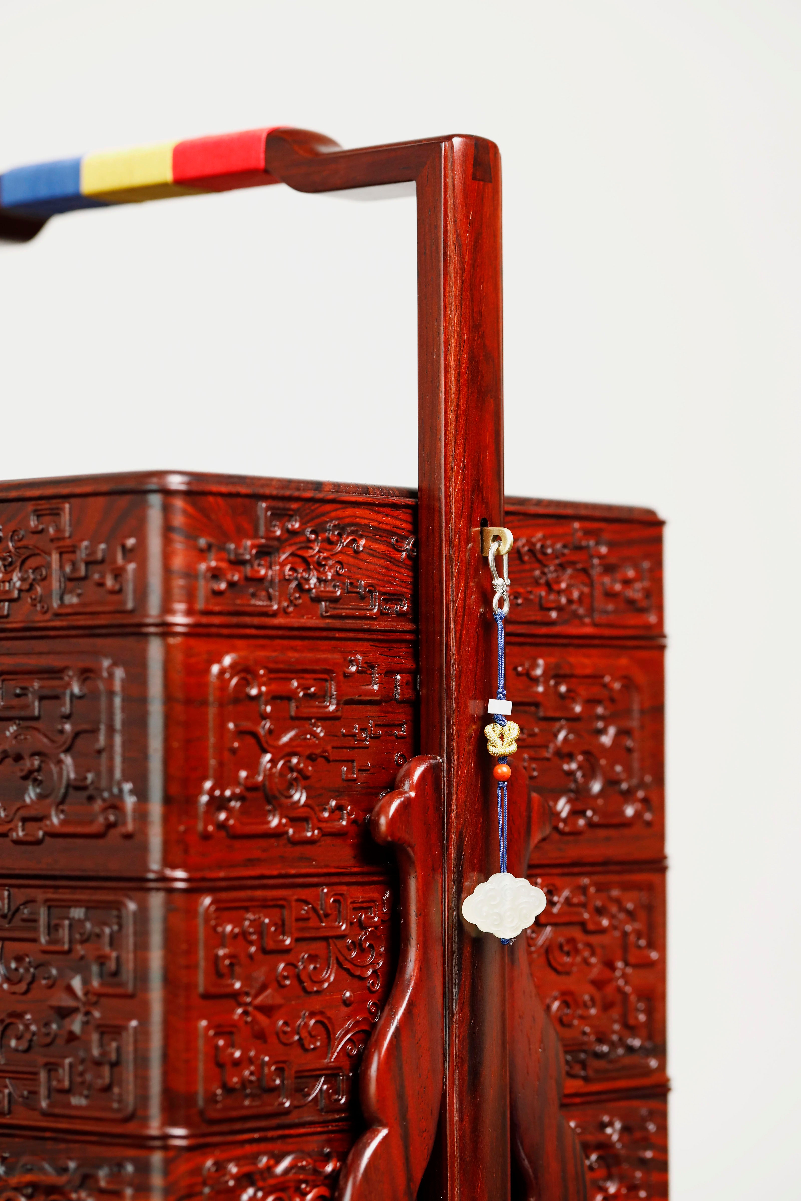 Rosewood square box with carved dragon and phoenix patterns