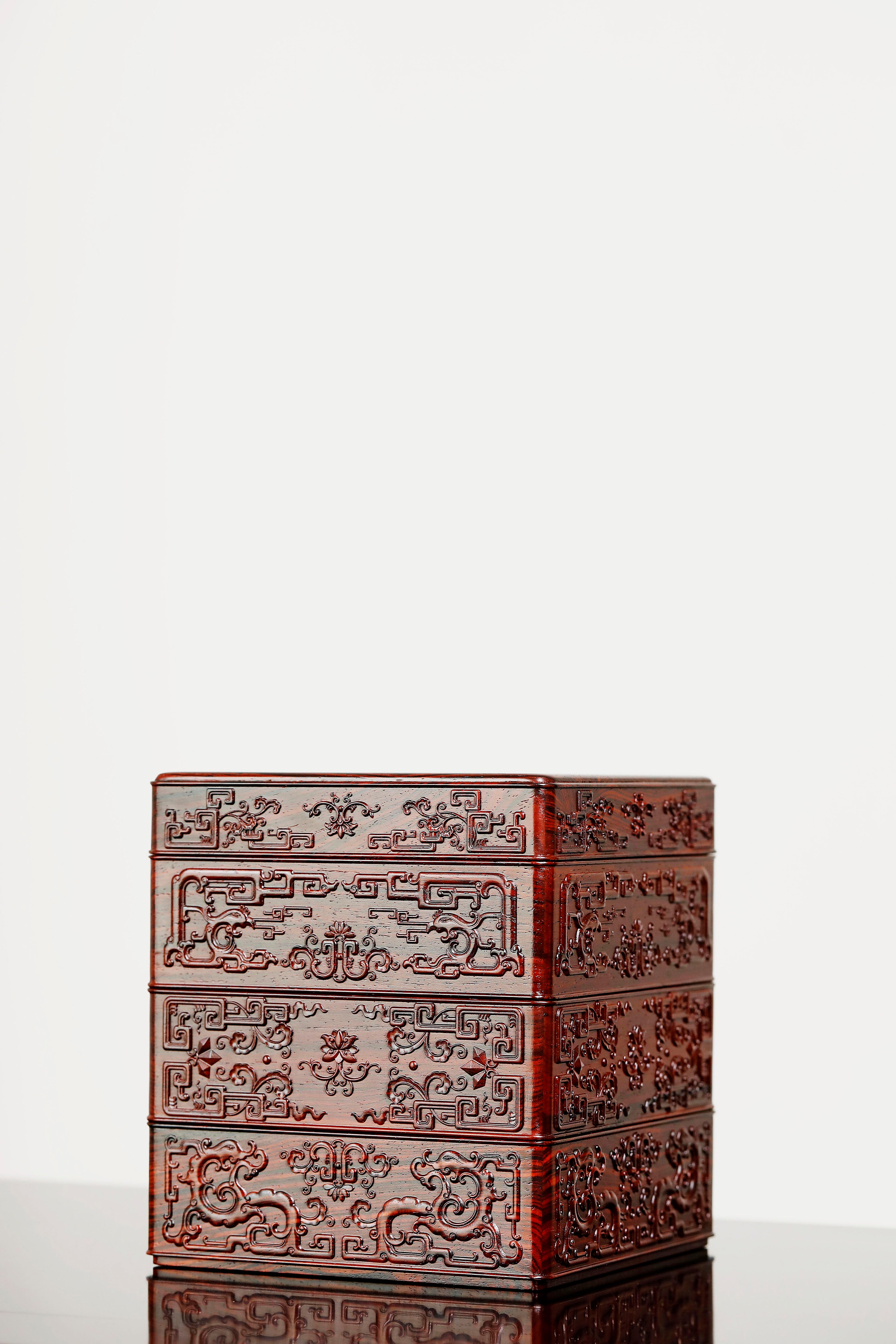 Rosewood square box with carved dragon and phoenix patterns