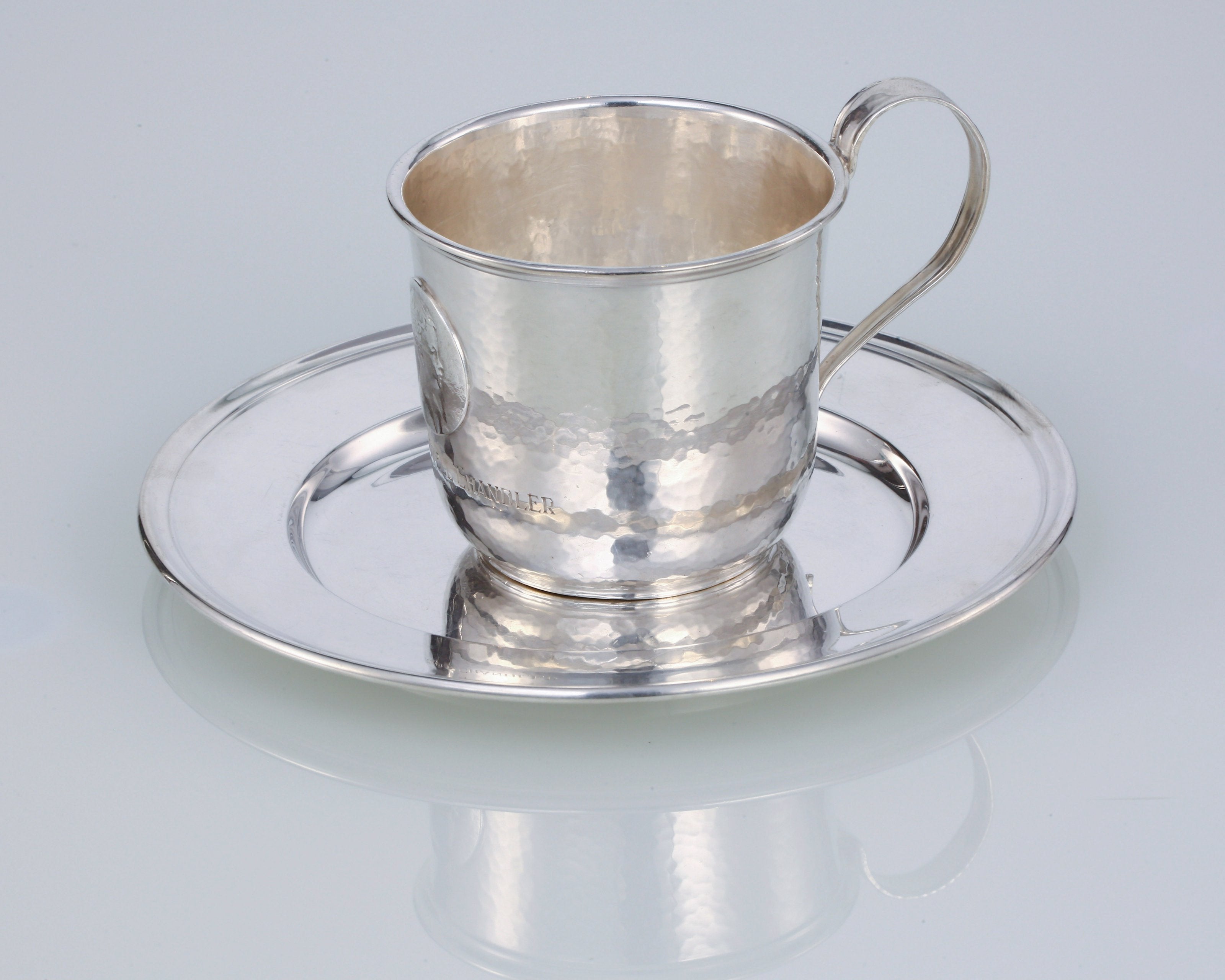 A set of 19th-century American sterling silver hammered teacups