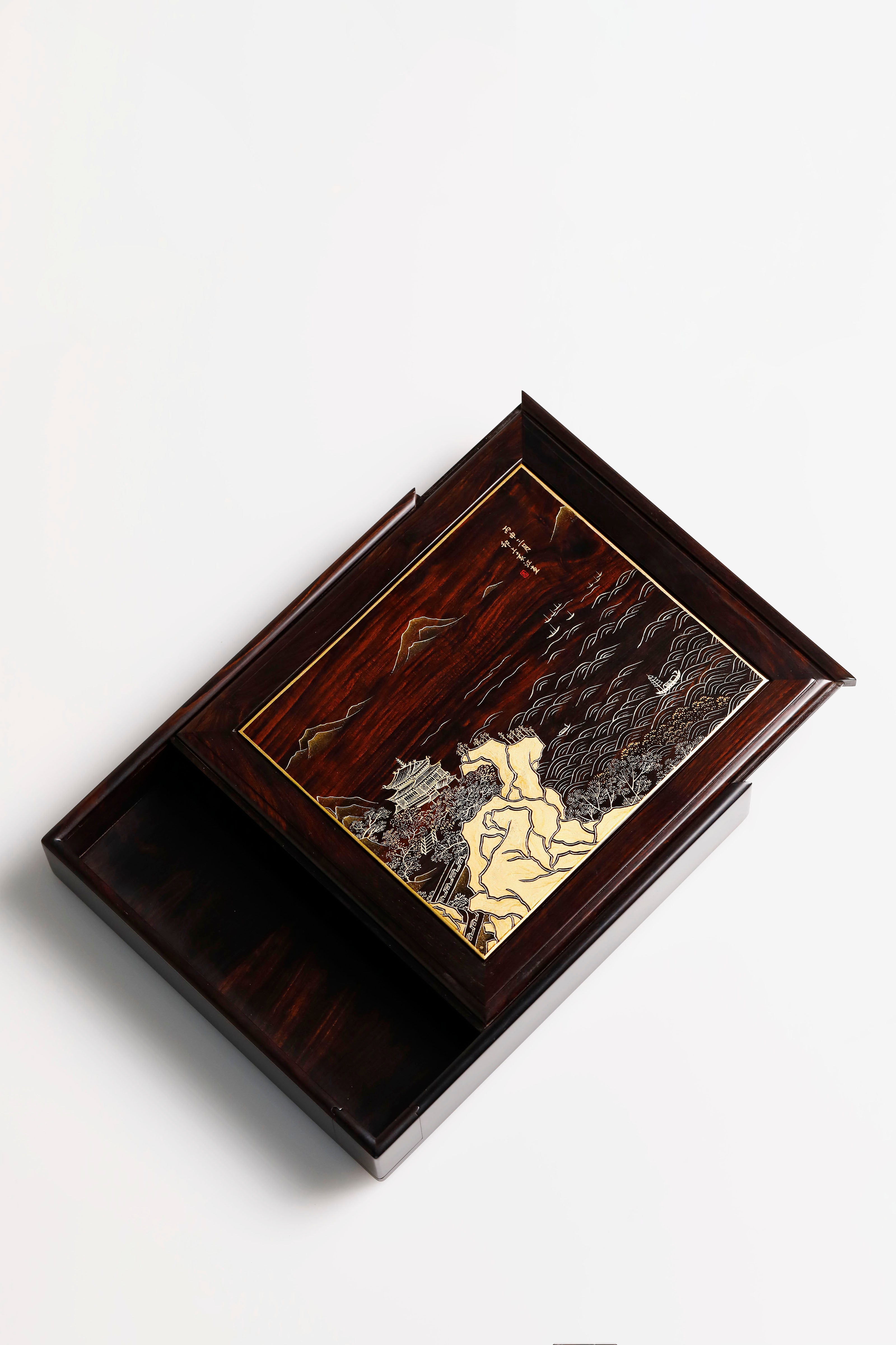 Purple sandalwood tea box with gold-painted "Watching the Tide" design