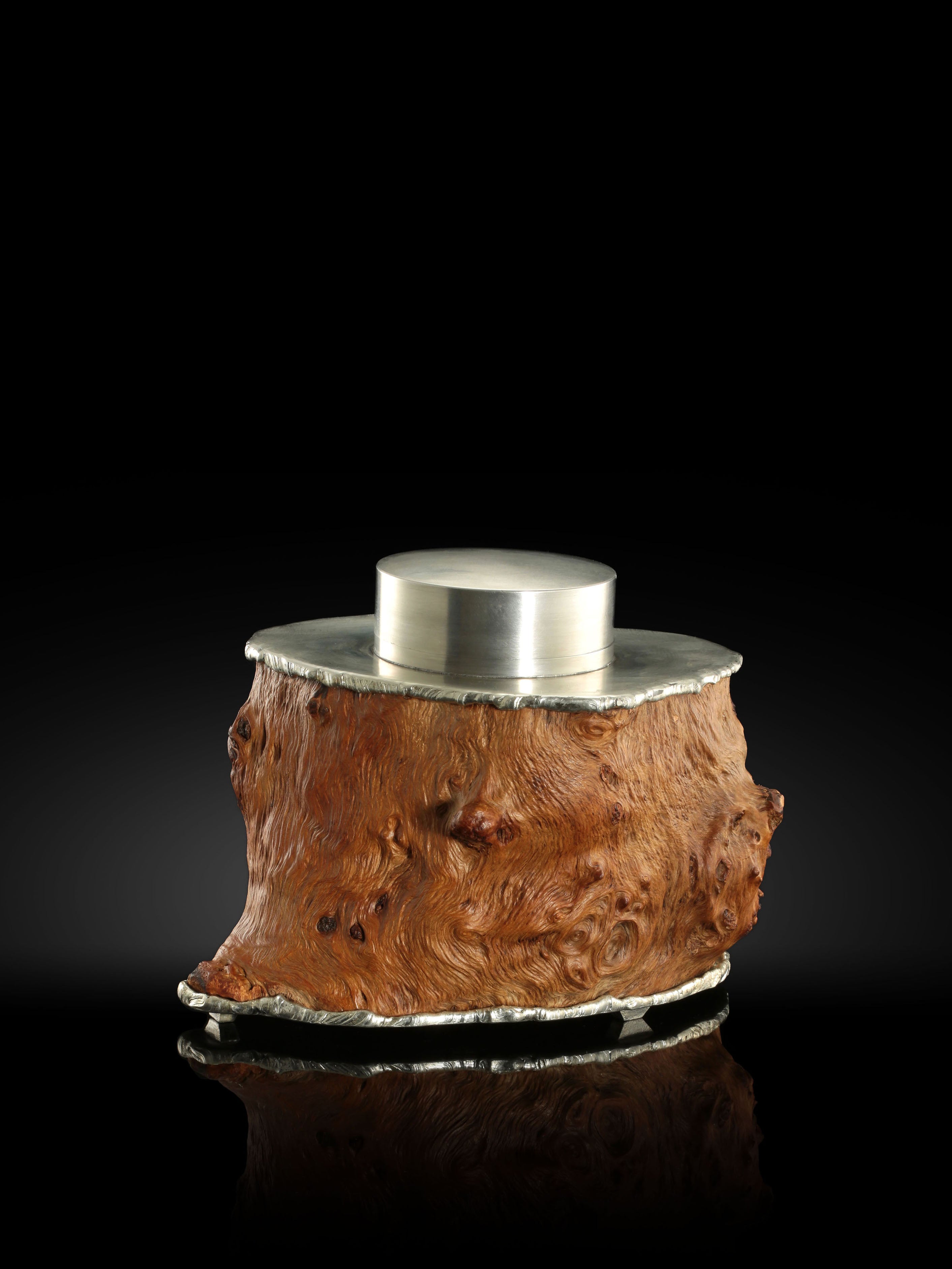 Intricately carved tin burl wood tea caddy