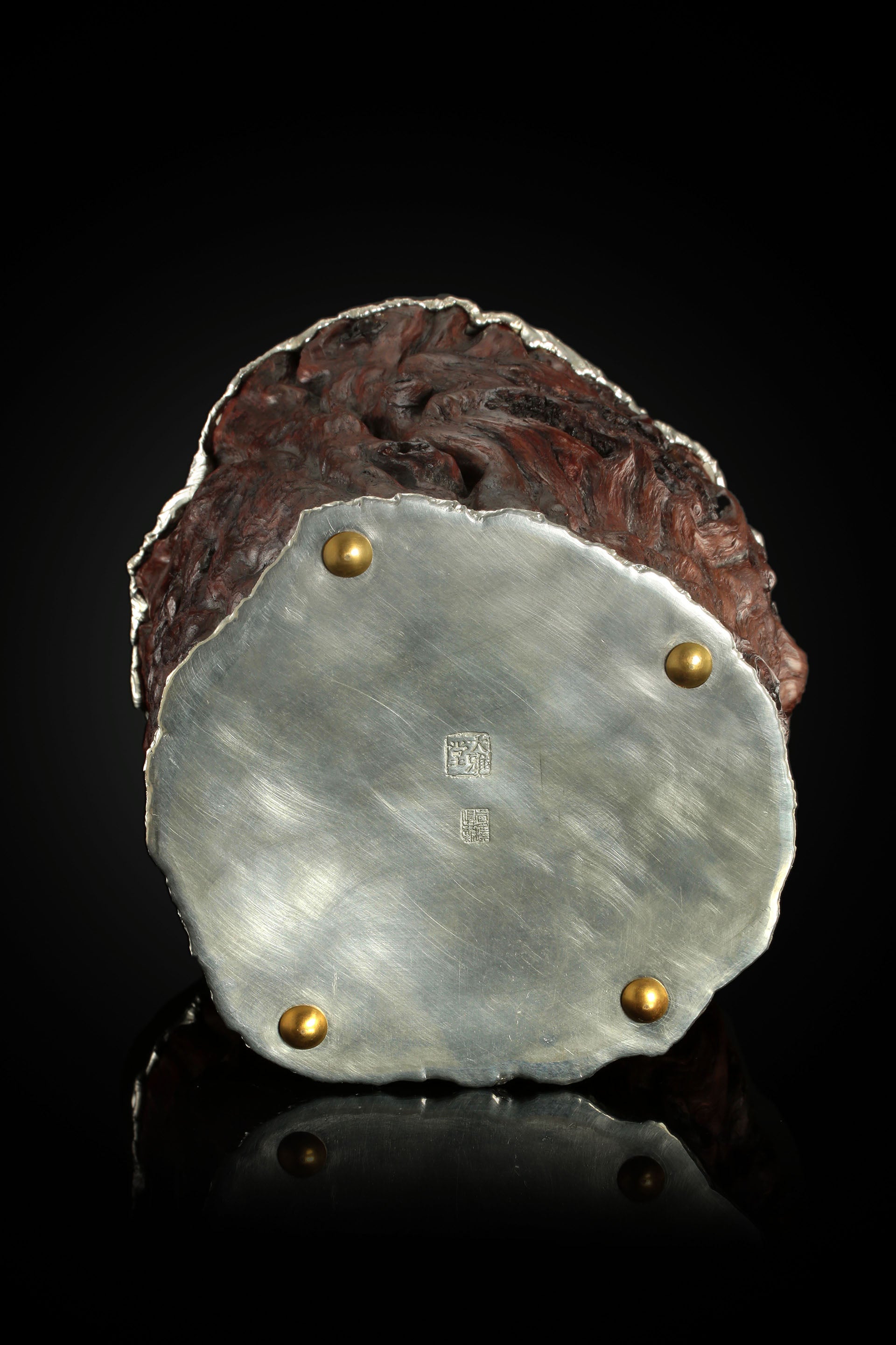 Curved and rugged tin-carved burl wood tea canister