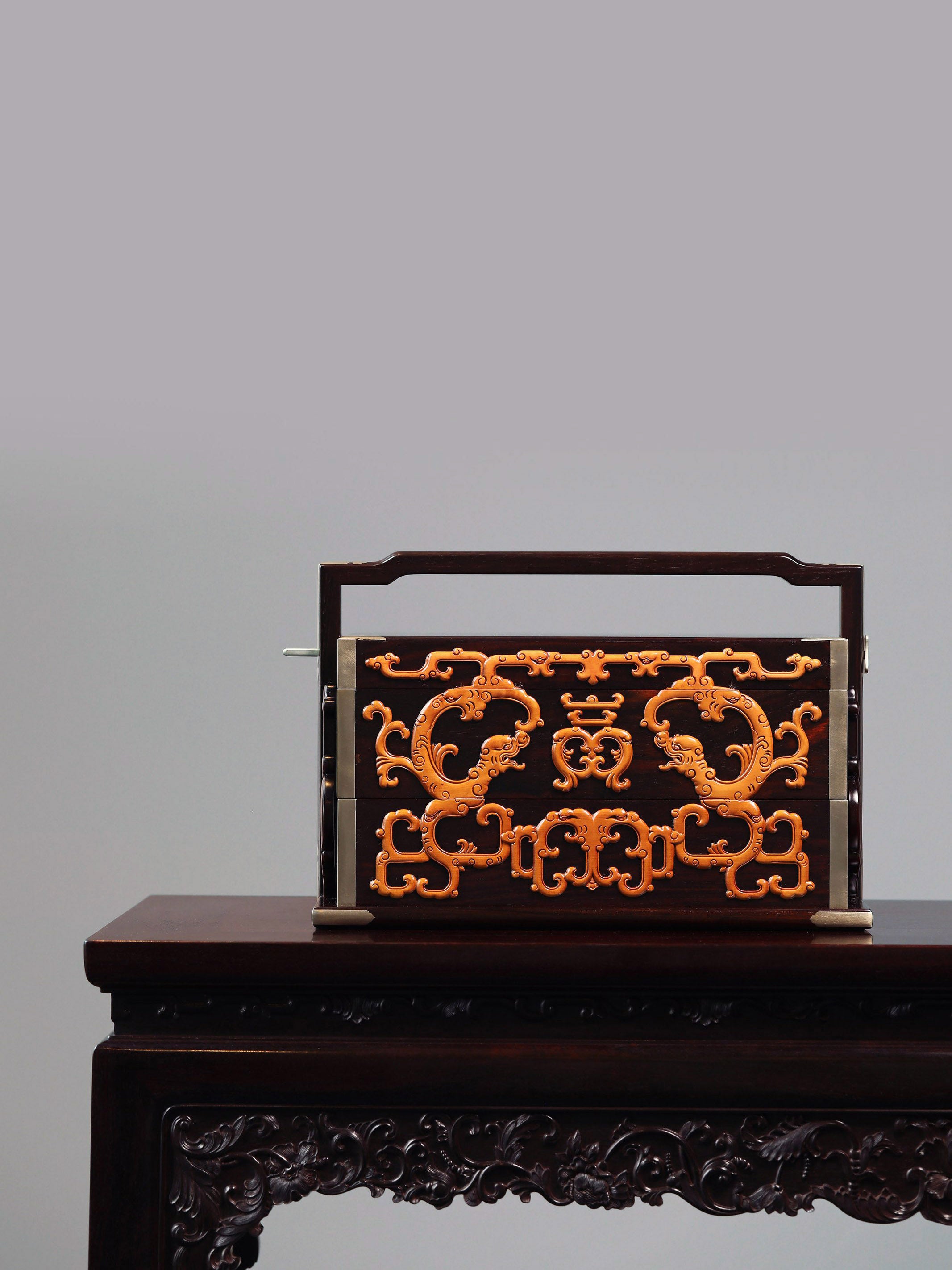 Double-layered box made of rosewood inlaid with boxwood dragons and longevity symbols