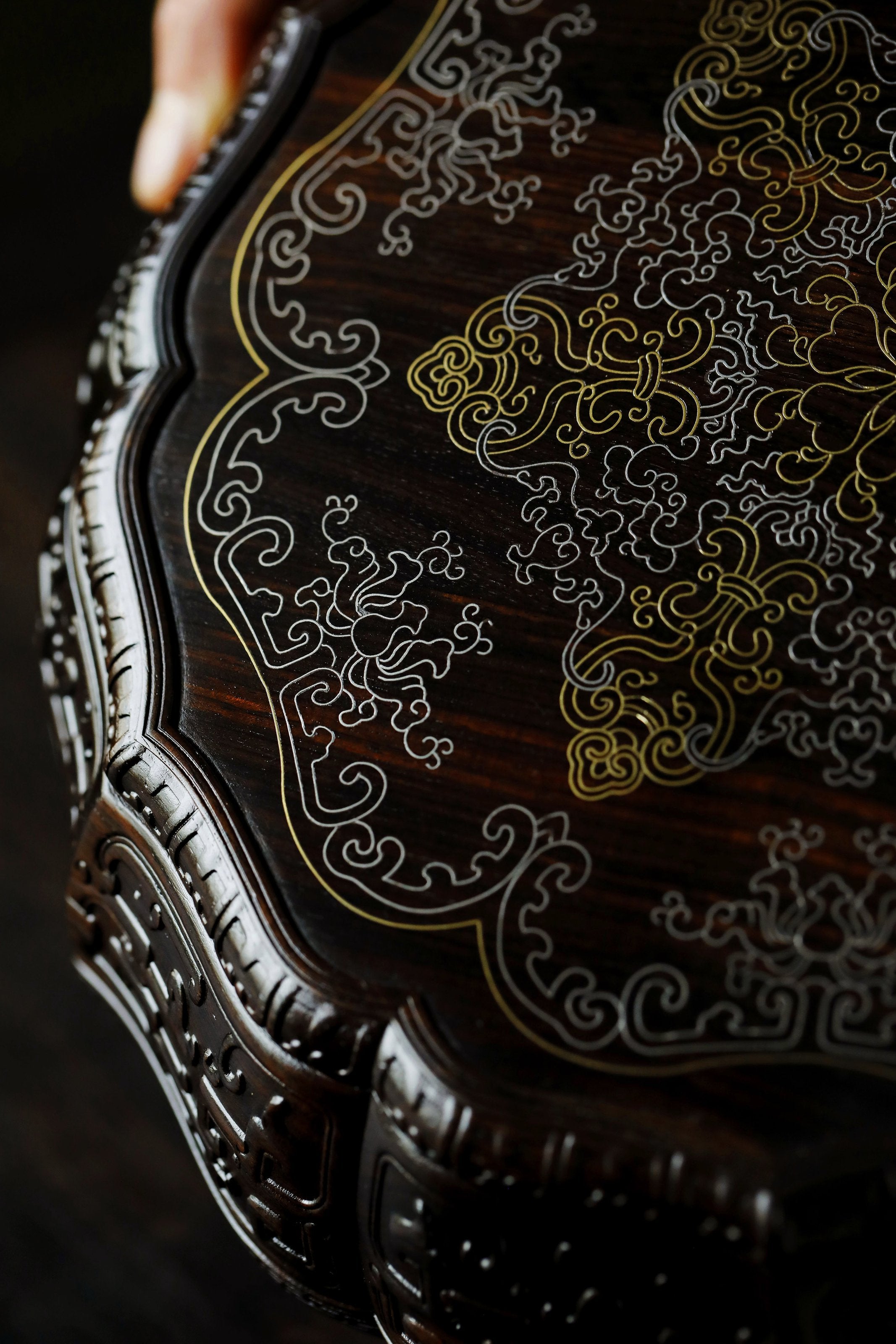 Purple sandalwood twelve-cornered fruit box inlaid with silver wire scrolling floral pattern