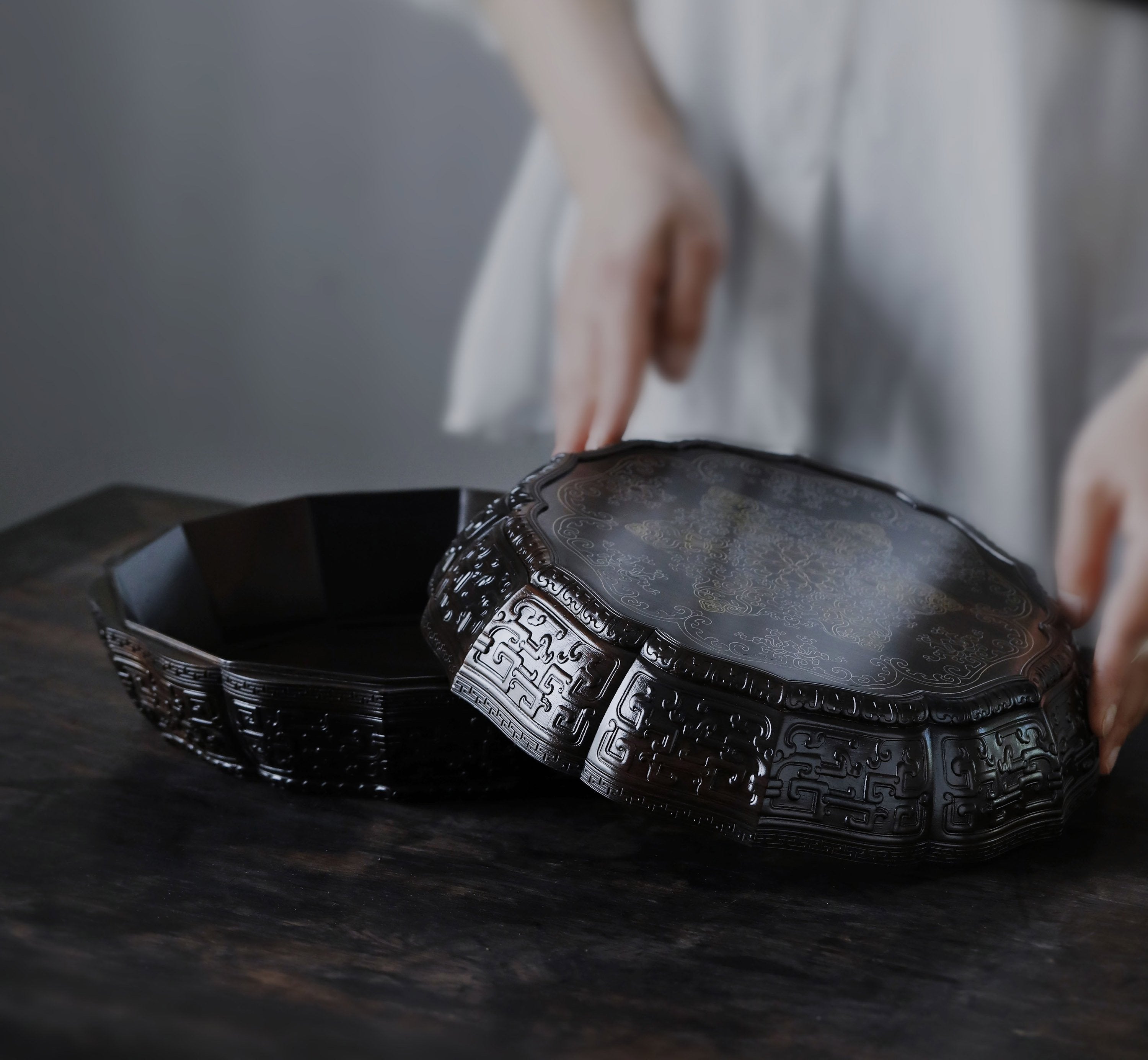 Purple sandalwood twelve-cornered fruit box inlaid with silver wire scrolling floral pattern