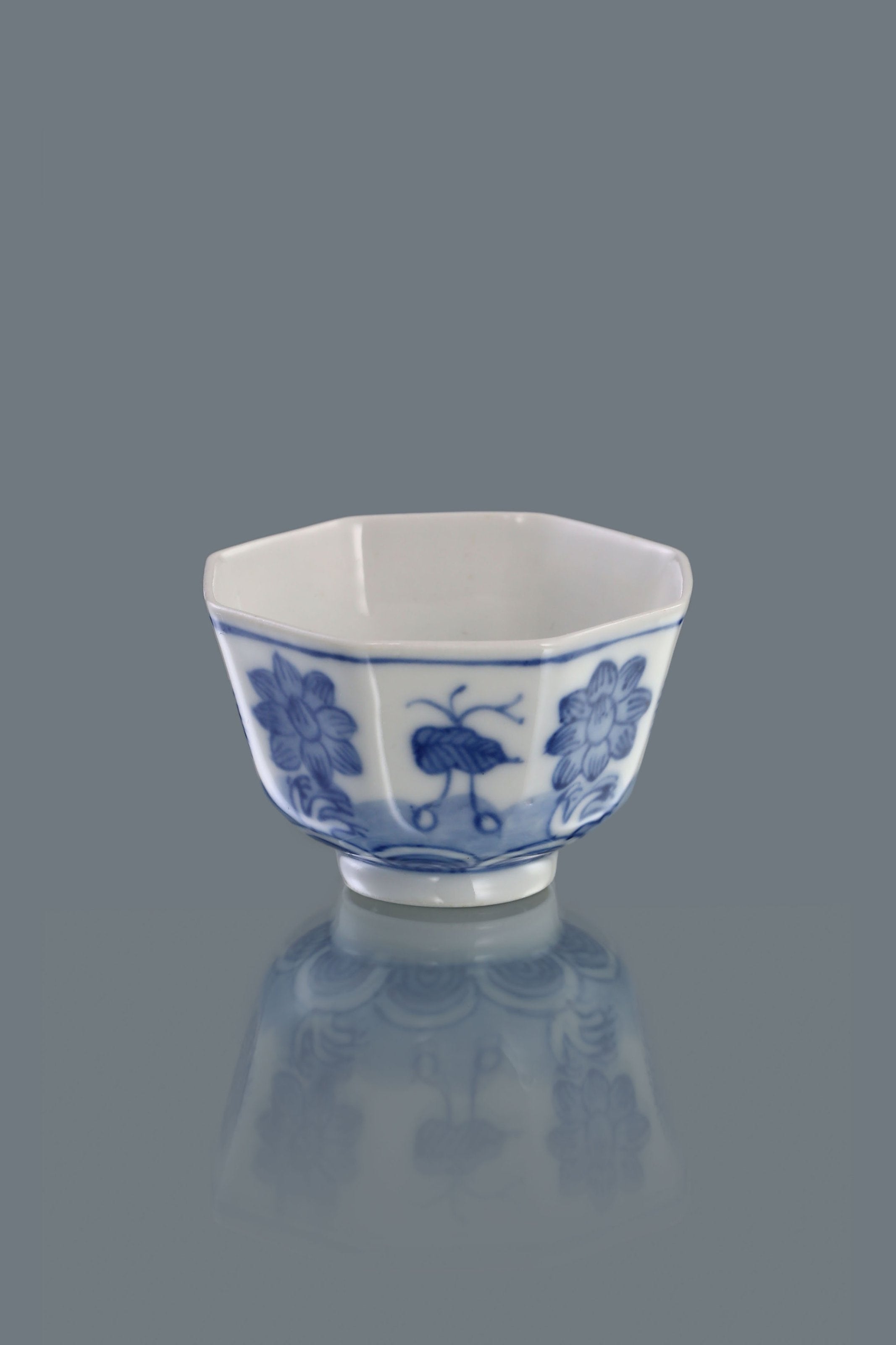 Blue and white floral octagonal cup
