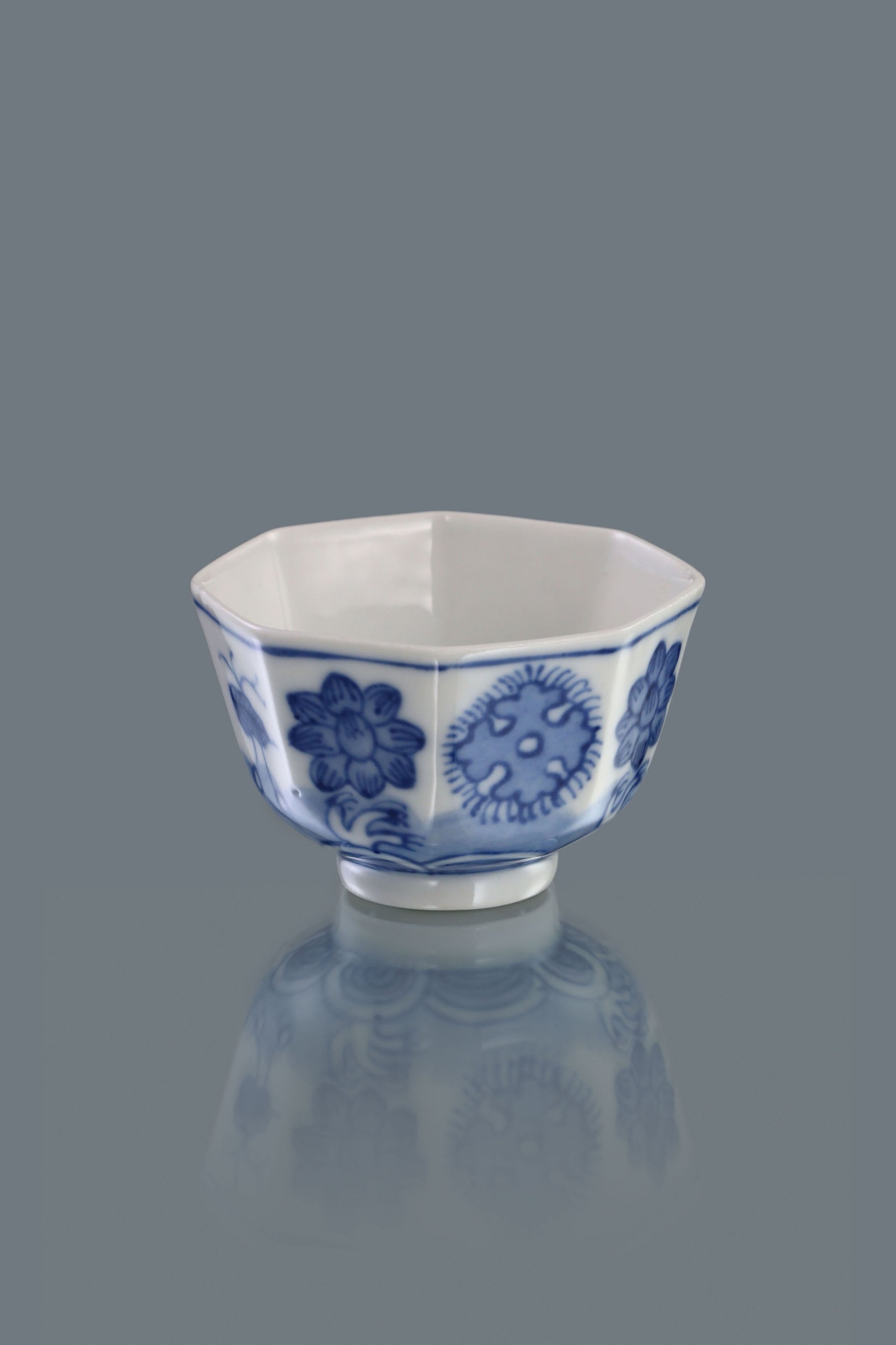 Blue and white floral octagonal cup