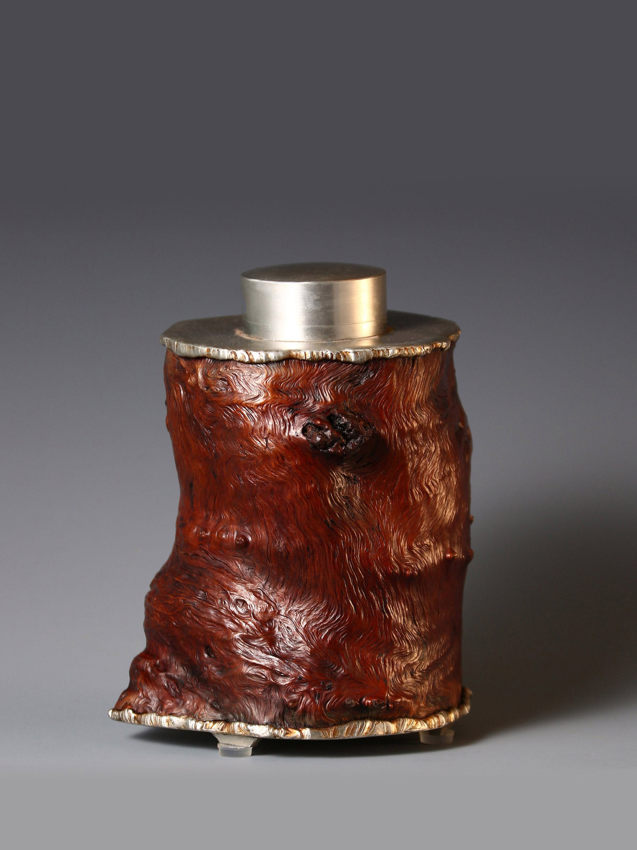 Strong and powerful tin-carved burl wood tea caddy
