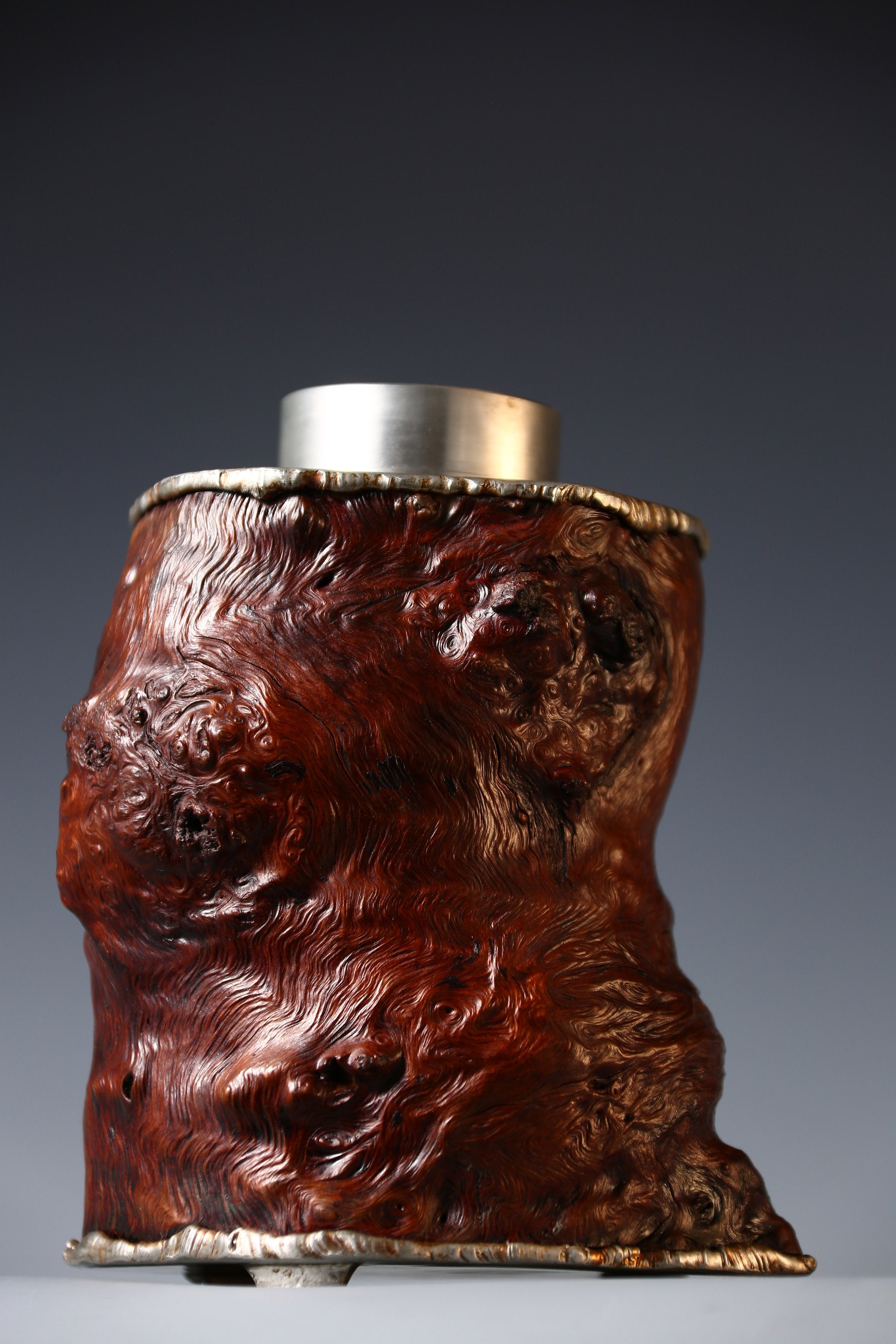 Strong and powerful tin-carved burl wood tea caddy