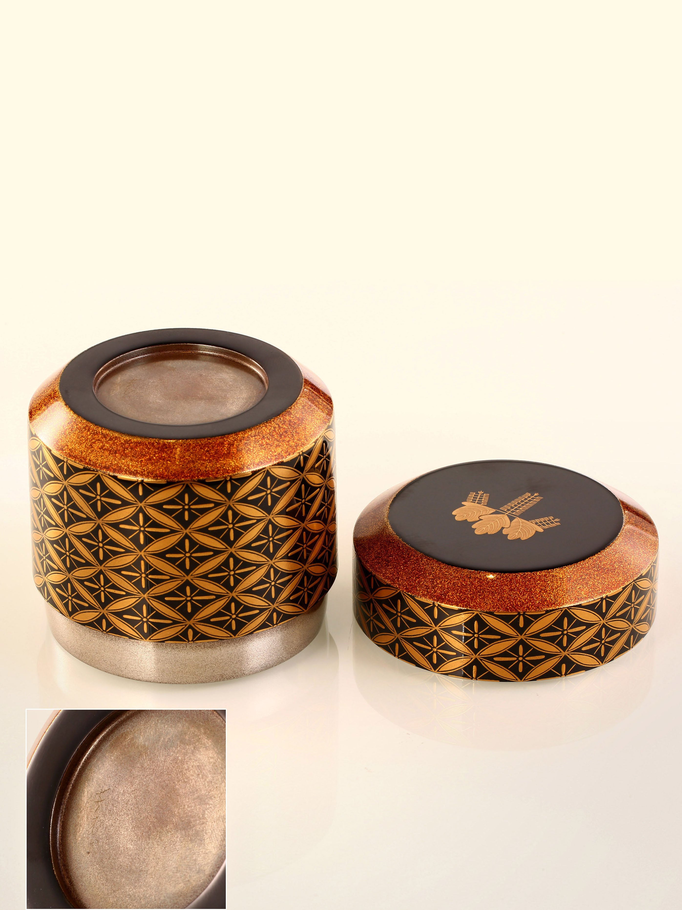 Japanese gold maki-e (a type of embroidery) with seven treasures and snow-blown dates.