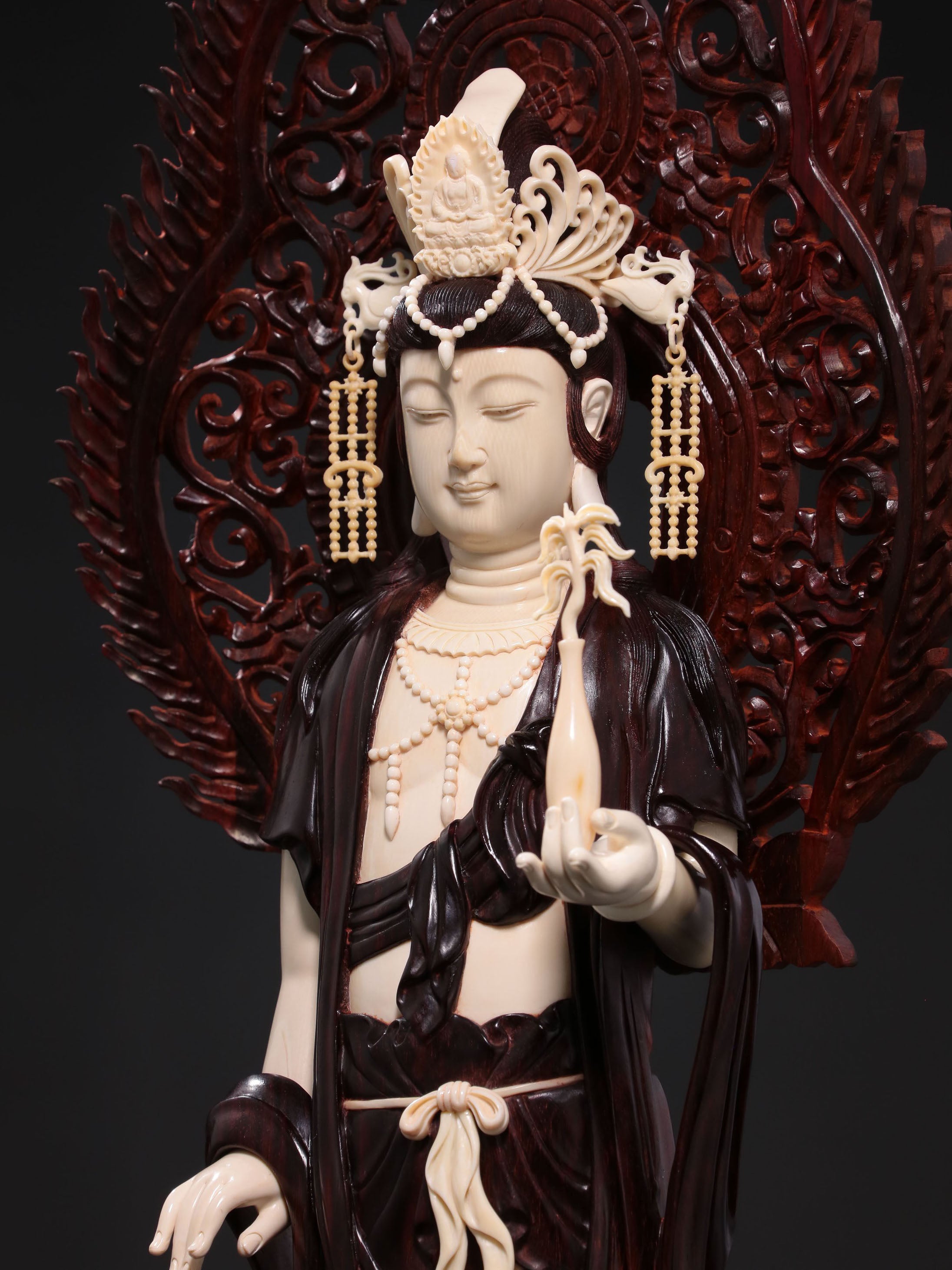 Guanyin holding a treasure vase