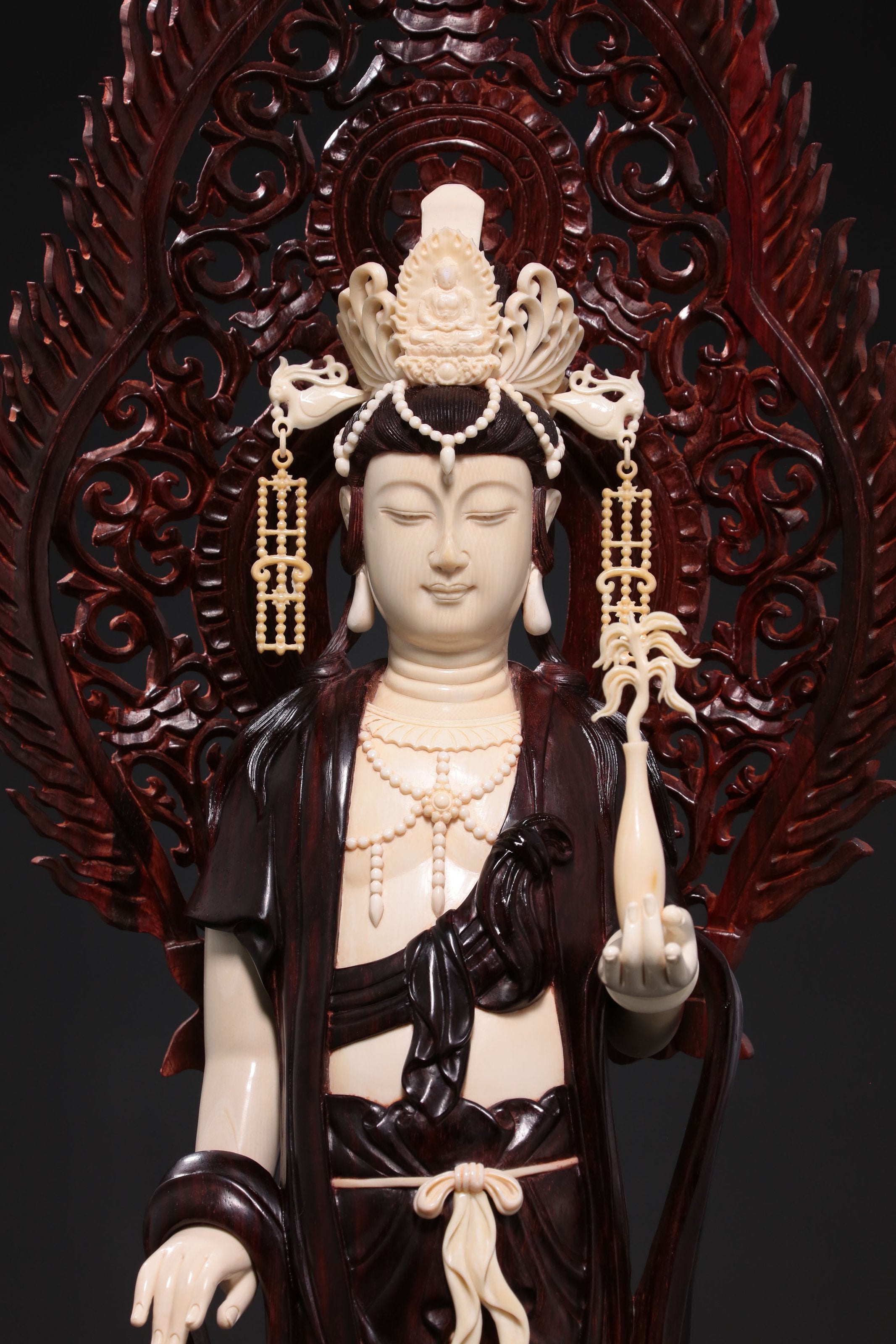 Guanyin holding a treasure vase