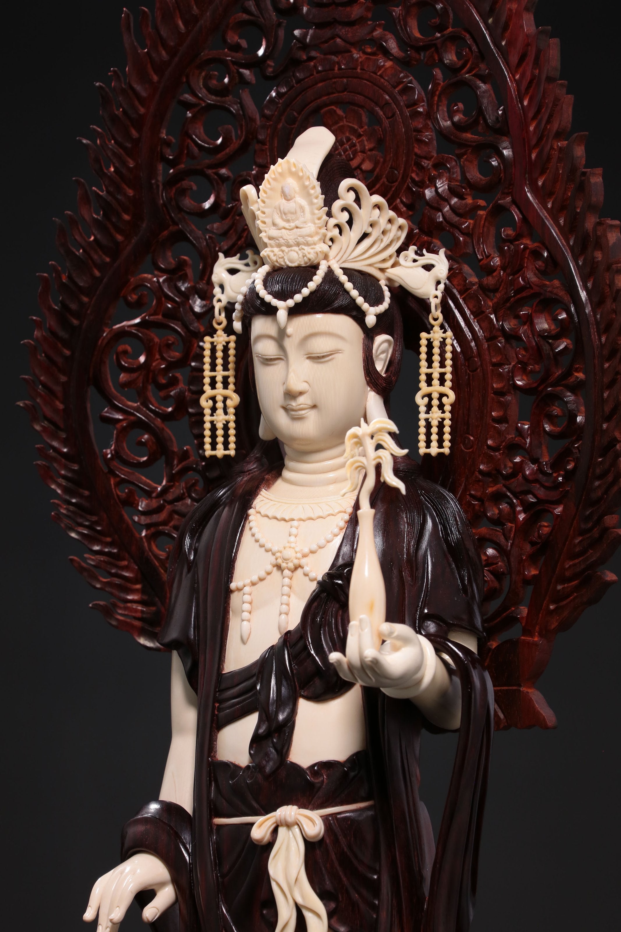 Guanyin holding a treasure vase