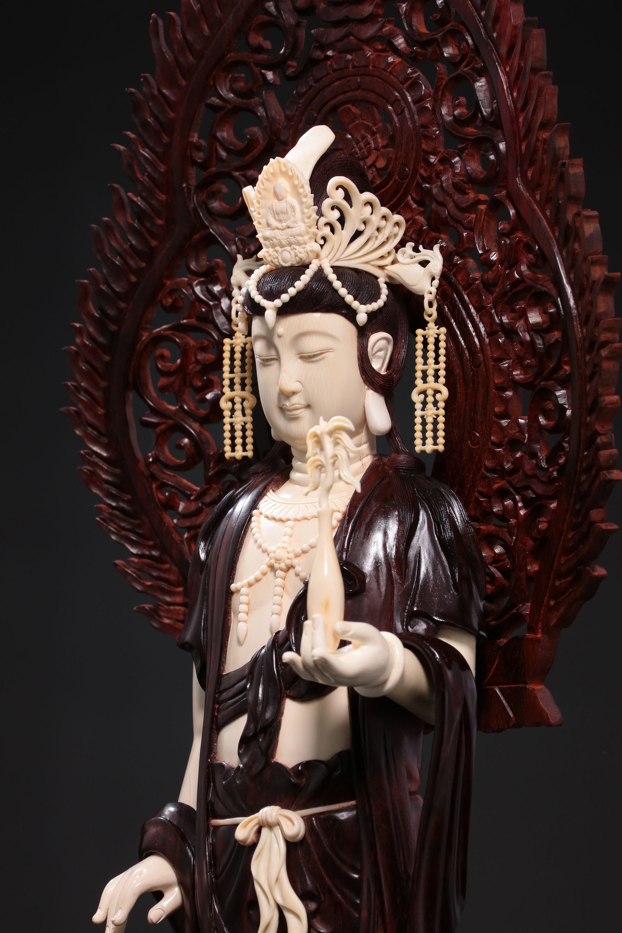 Guanyin holding a treasure vase