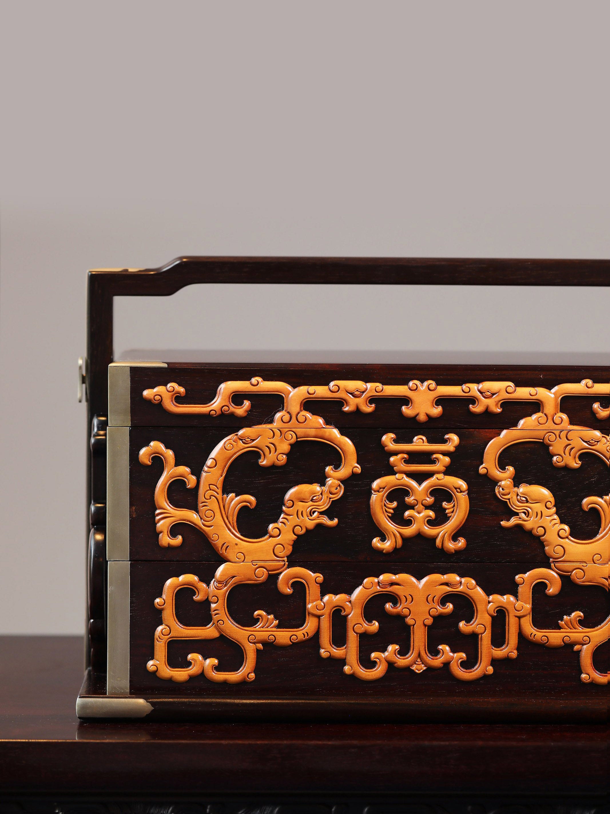 Double-layered box made of rosewood inlaid with boxwood dragons and longevity symbols