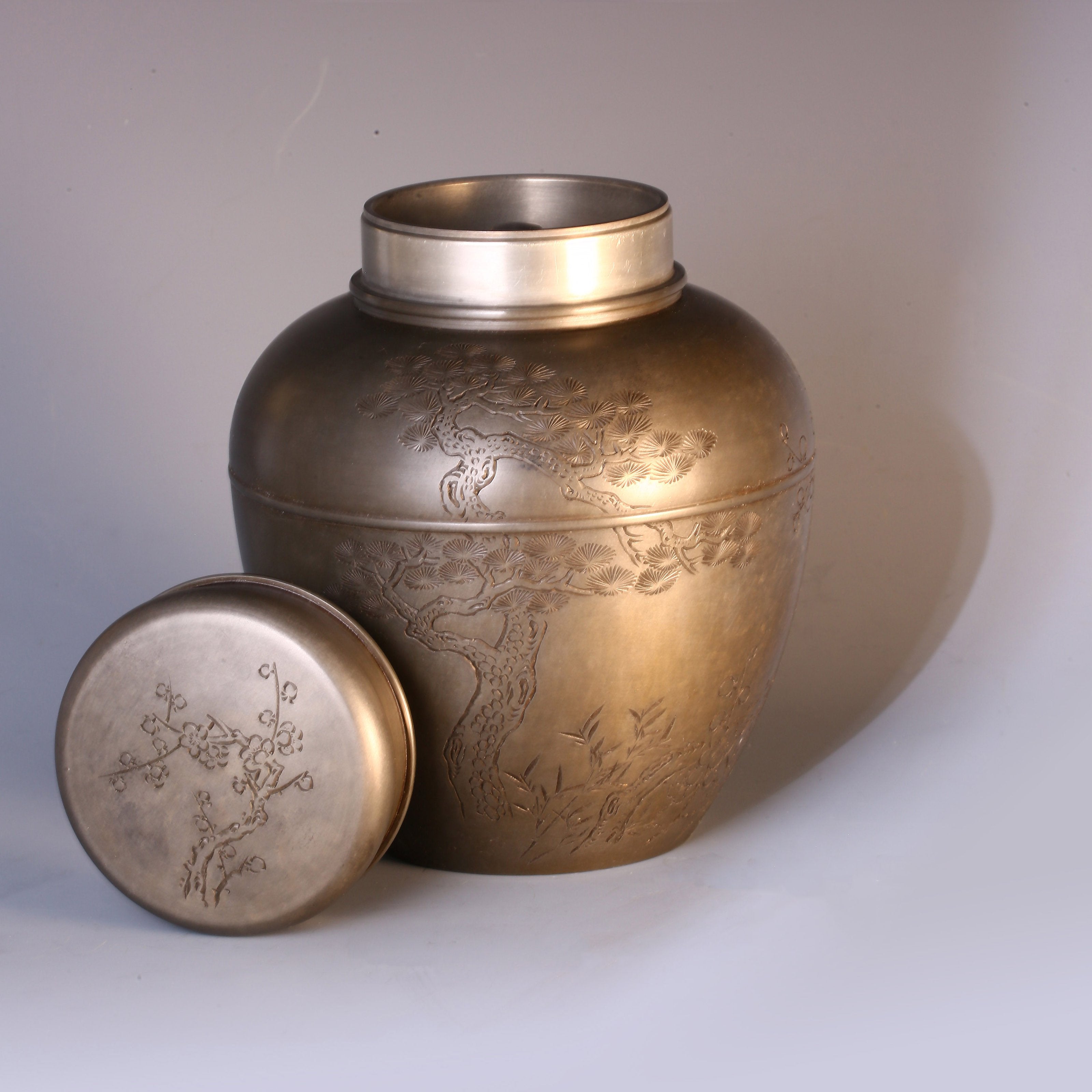 Pine, plum, and bamboo are known as the Three Friends – Antique Porcelain Tea Canister