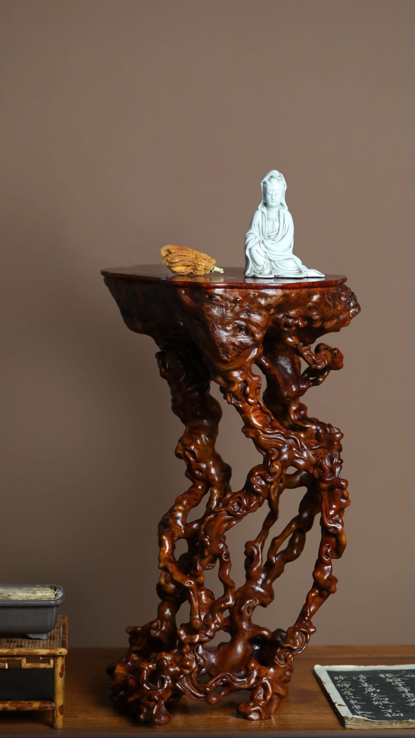 freeform root carving incense table