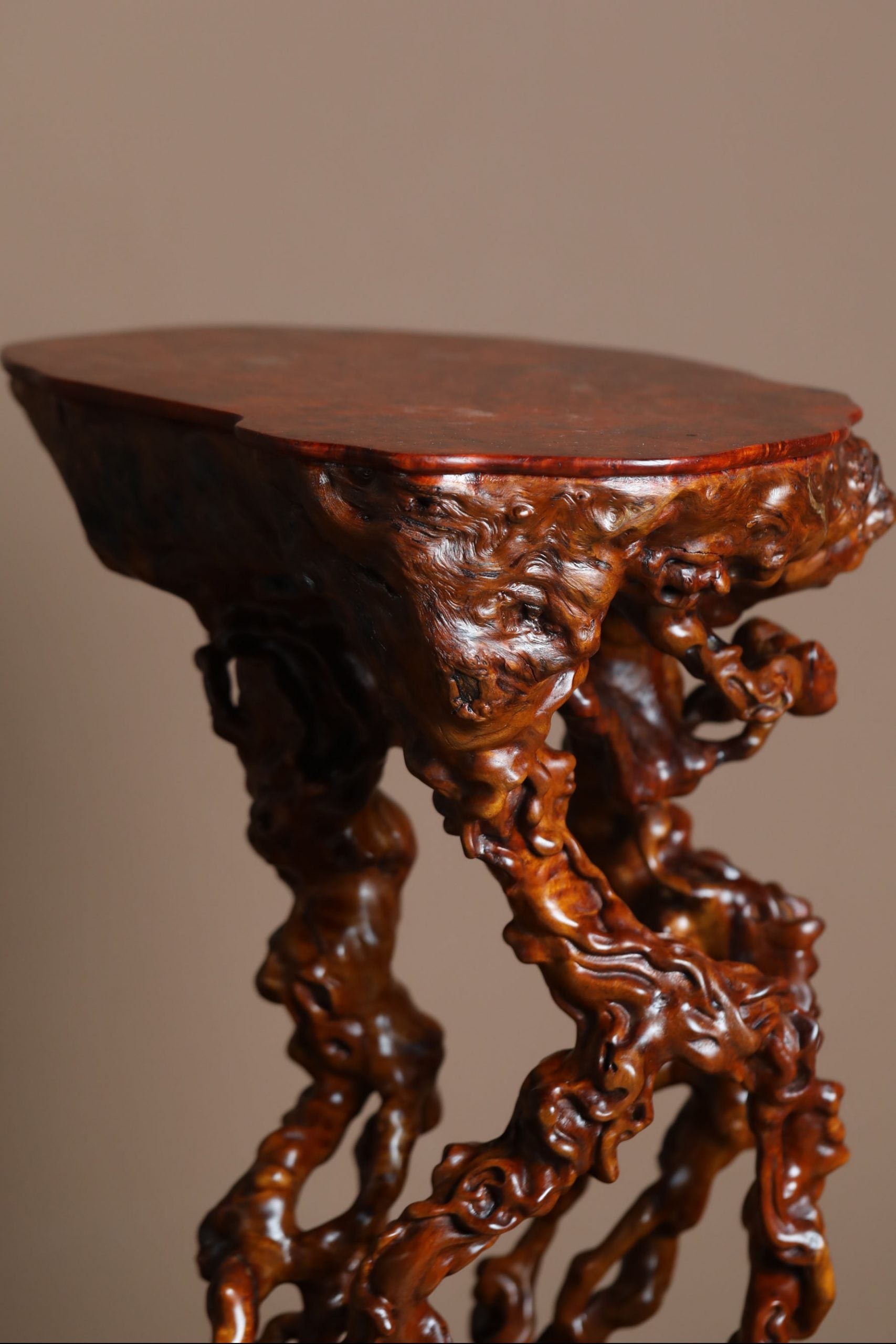 freeform root carving incense table