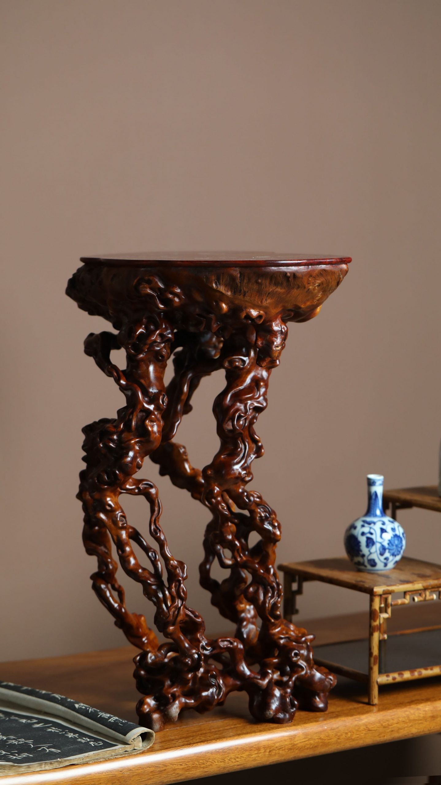 freeform root carving incense table