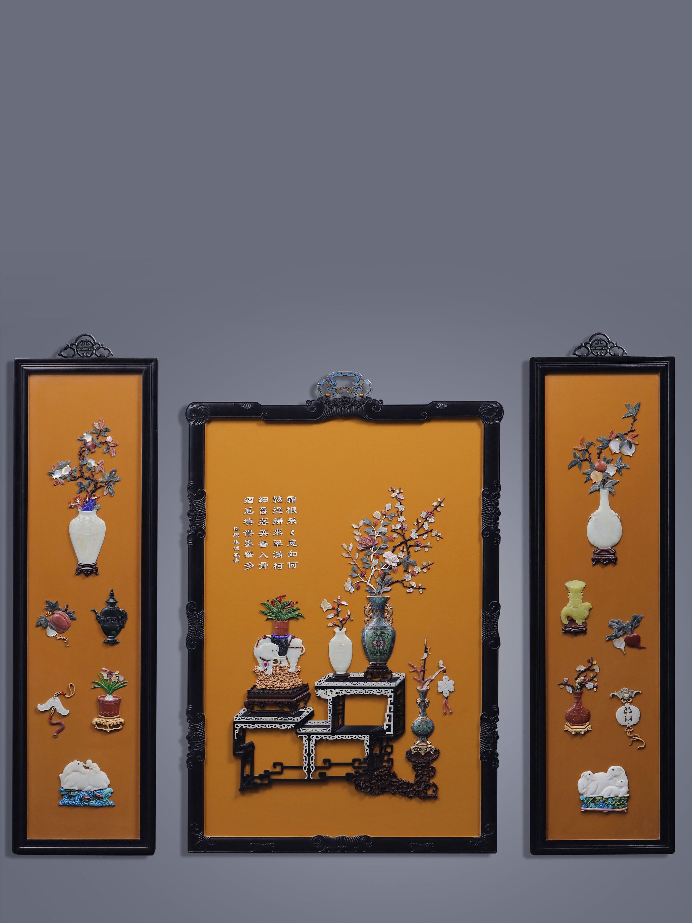 A hanging screen inlaid with precious stones, symbolizing peace and prosperity.