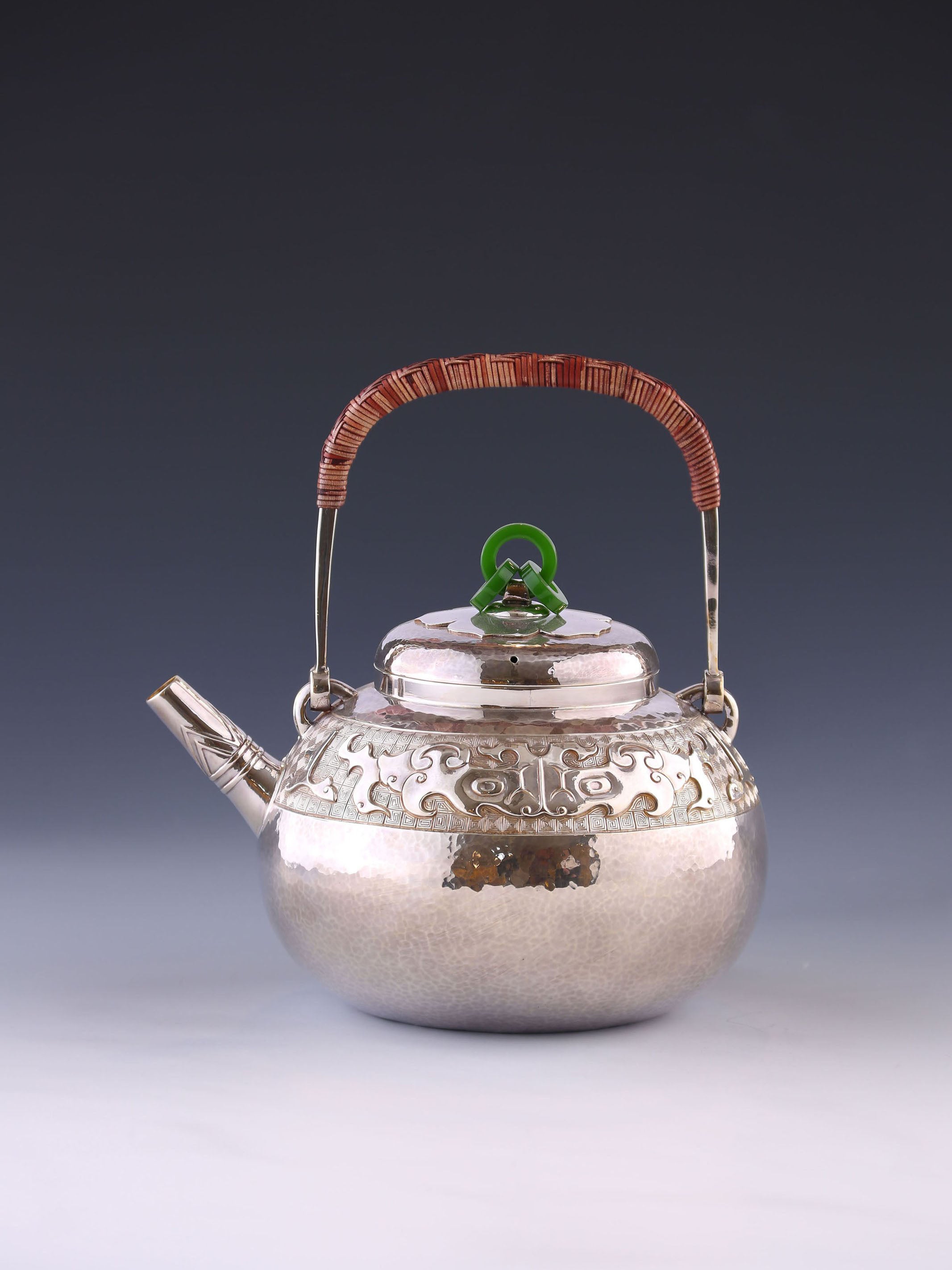 Silver ewer in the shape of a taotie pattern