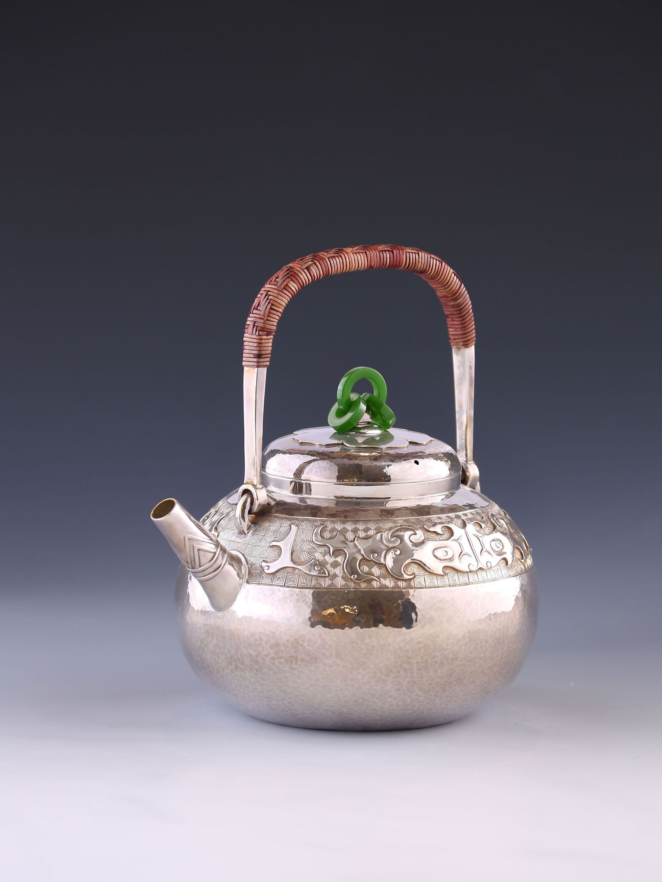 Silver ewer in the shape of a taotie pattern