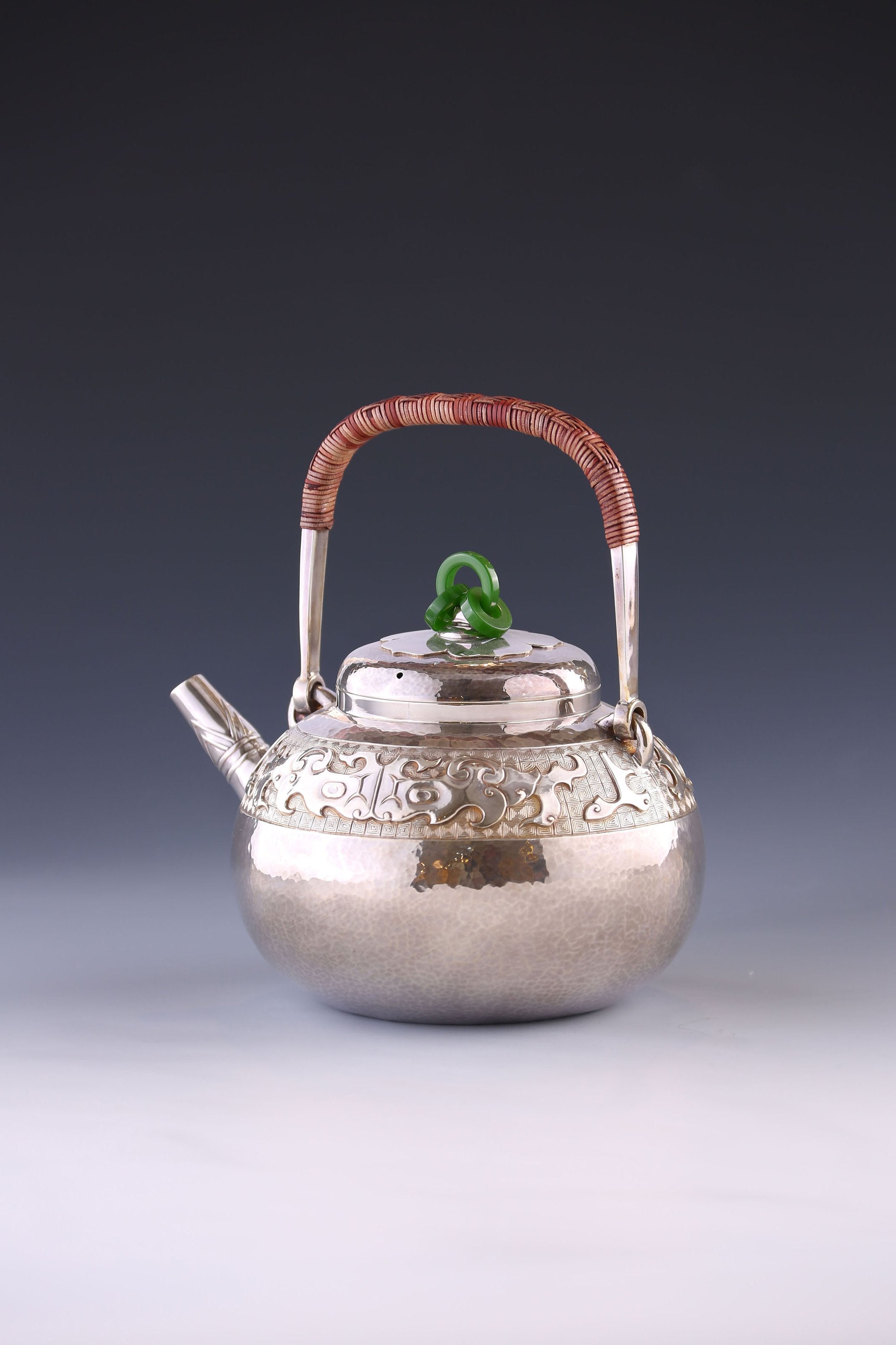 Silver ewer in the shape of a taotie pattern