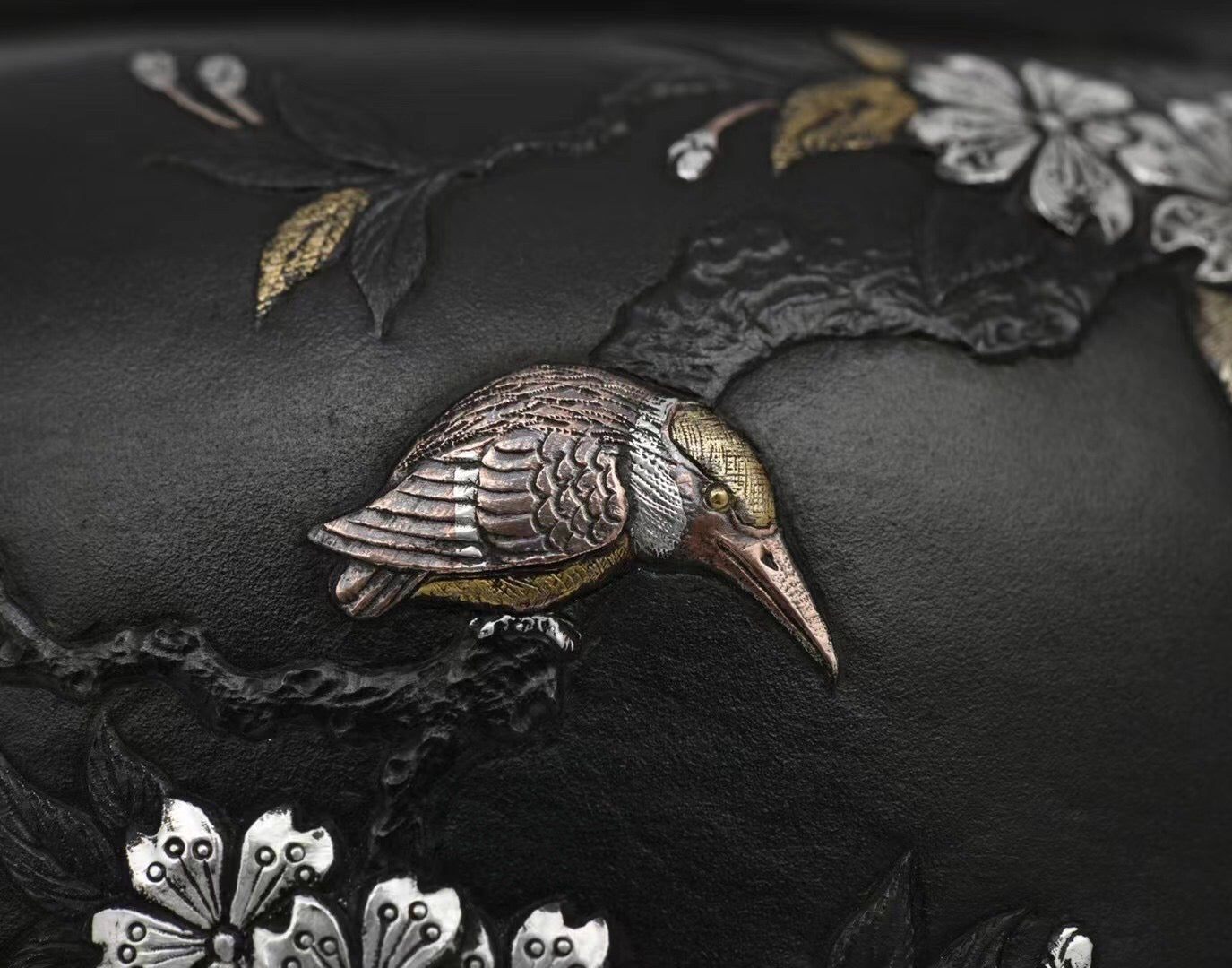 Iron-clad silver flower and bird inlaid gold and silver teapot