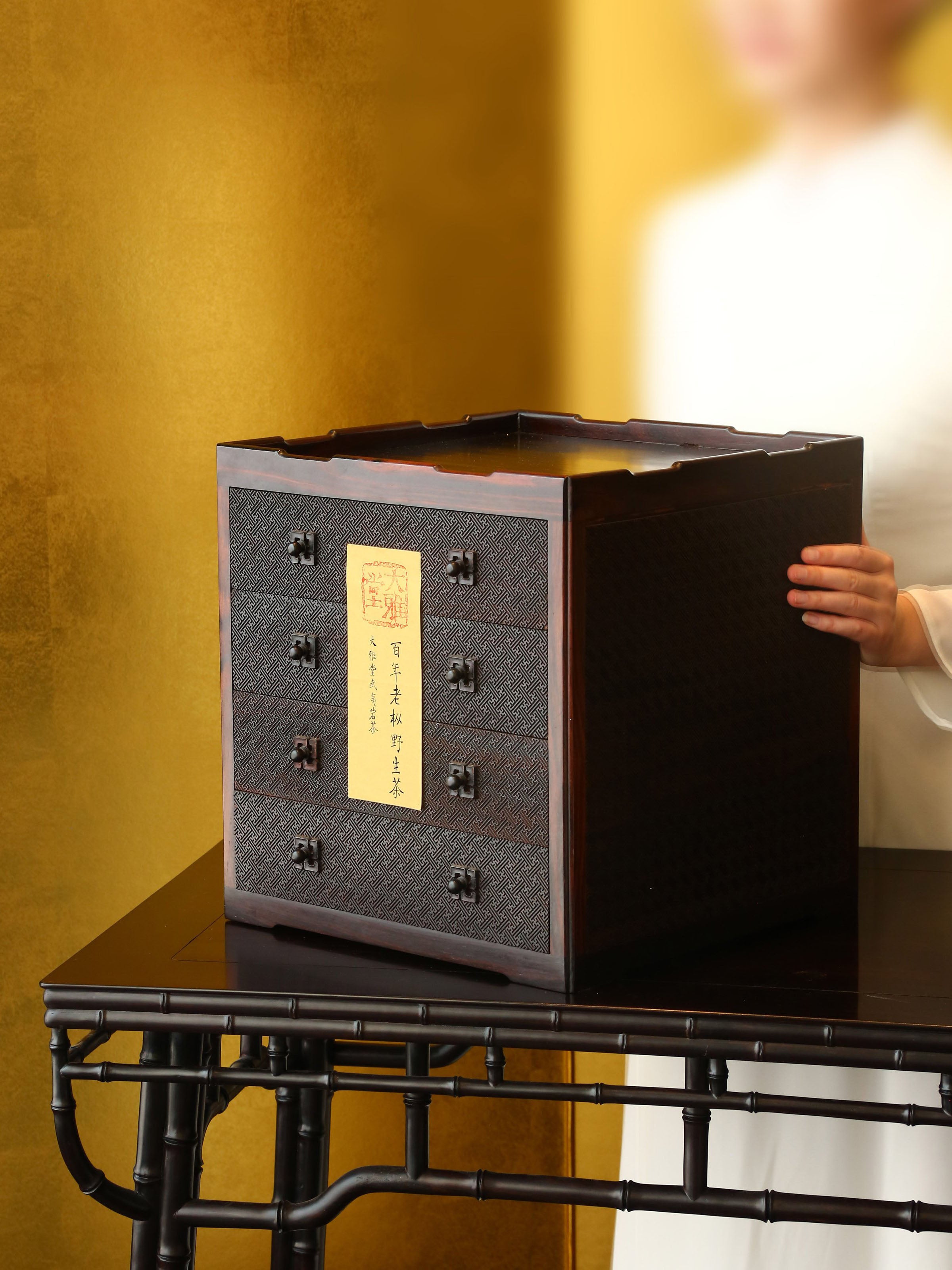 Four-drawer tea box carved with swastika pattern from rosewood.