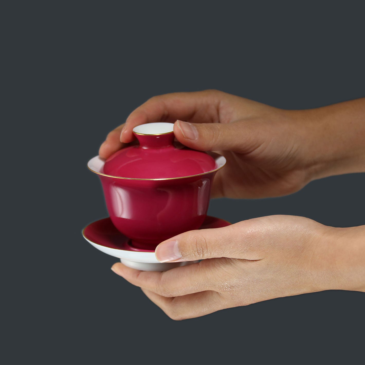 Rouge stains the bowl with gold, / Rouge leaves a trail of intoxication.