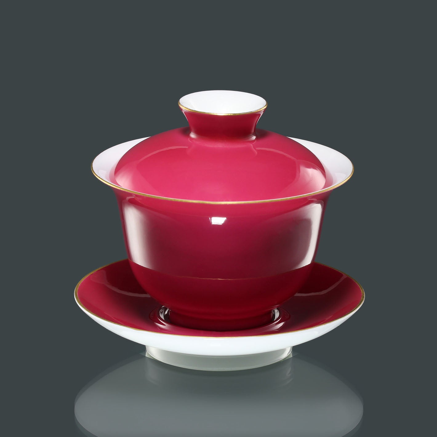 Rouge stains the bowl with gold, / Rouge leaves a trail of intoxication.