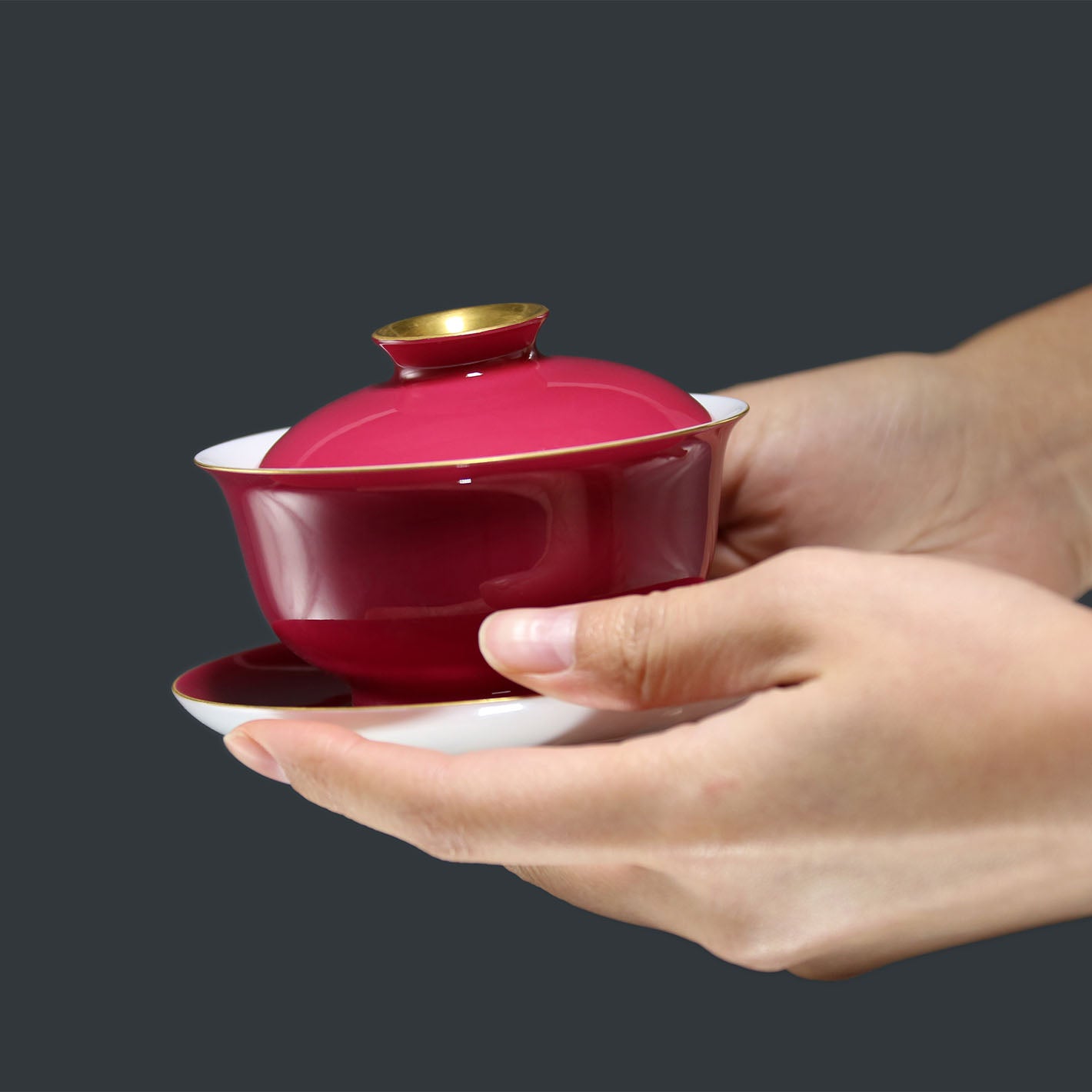 Rouge stains the bowl with gold, / Rouge leaves a trail of intoxication.