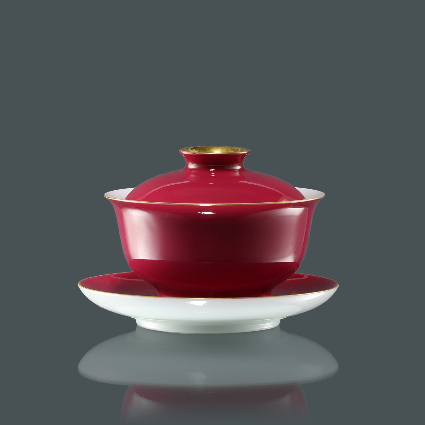 Rouge stains the bowl with gold, / Rouge leaves a trail of intoxication.