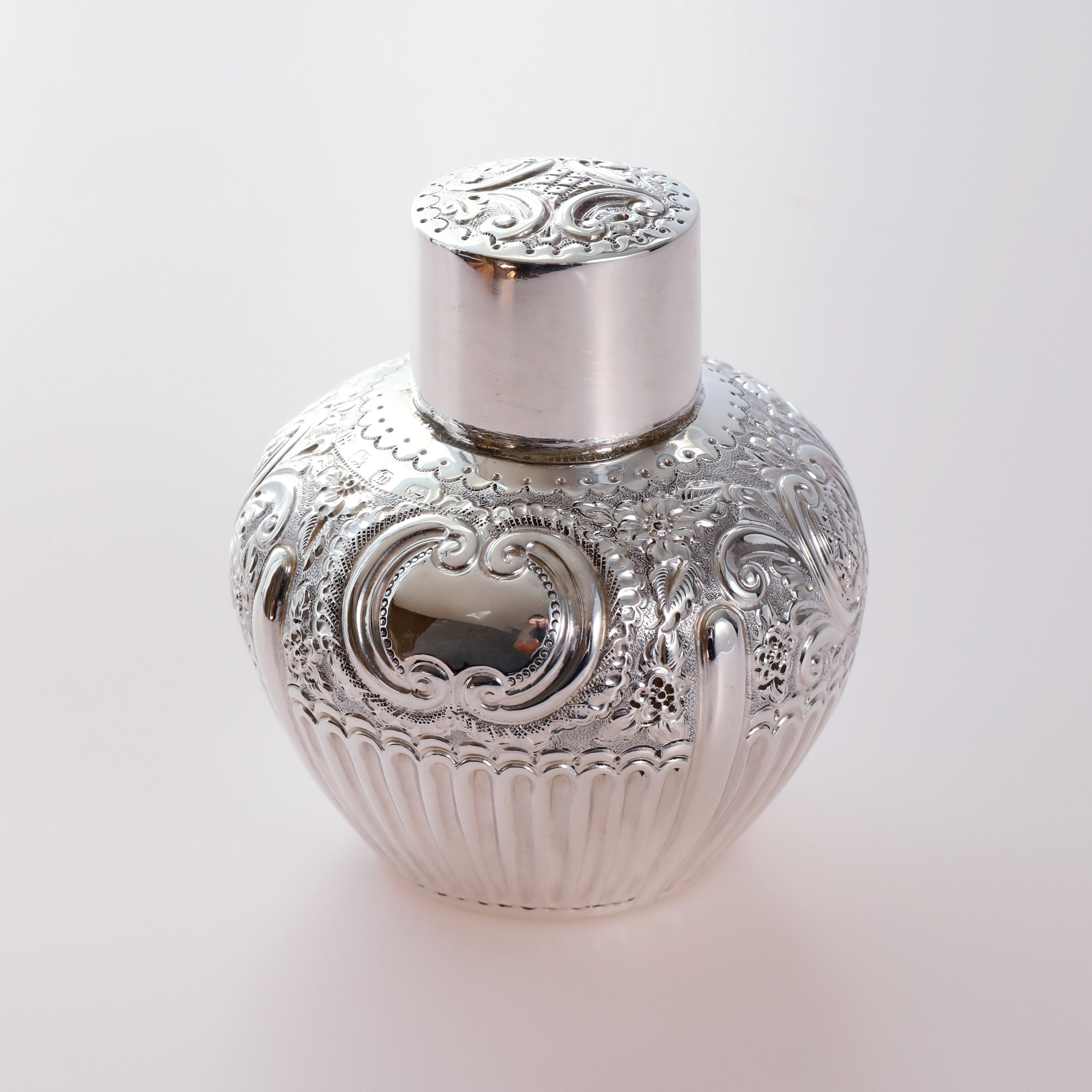 1896 British sterling silver embossed tea caddy