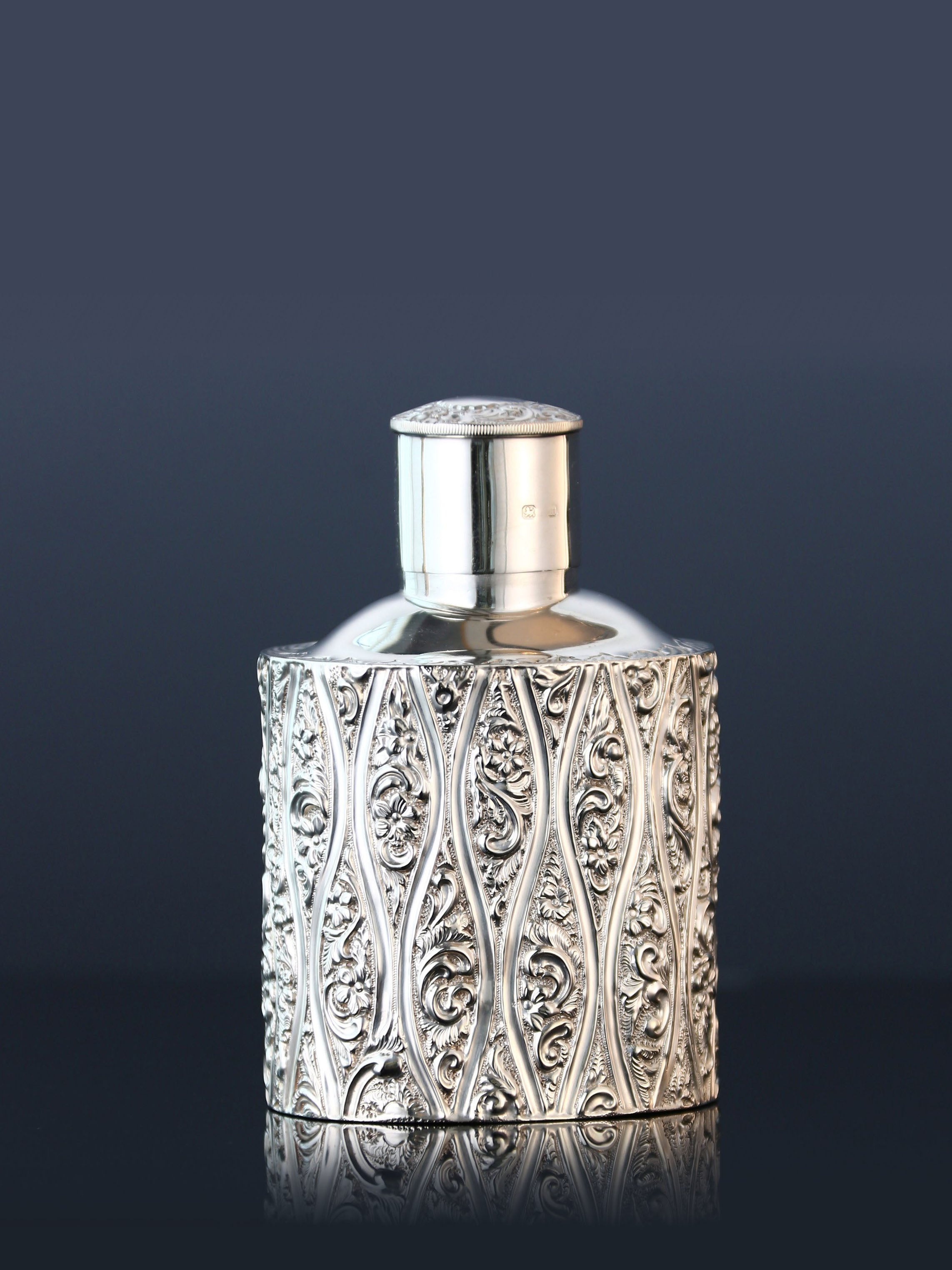 1896 British sterling silver embossed tea caddy