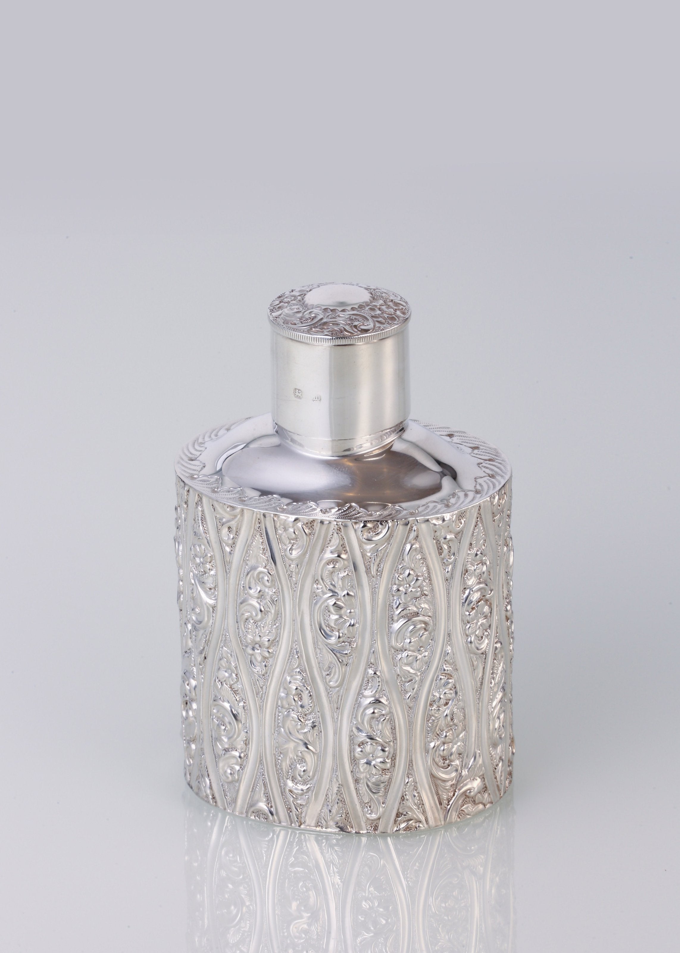 1896 British sterling silver embossed tea caddy