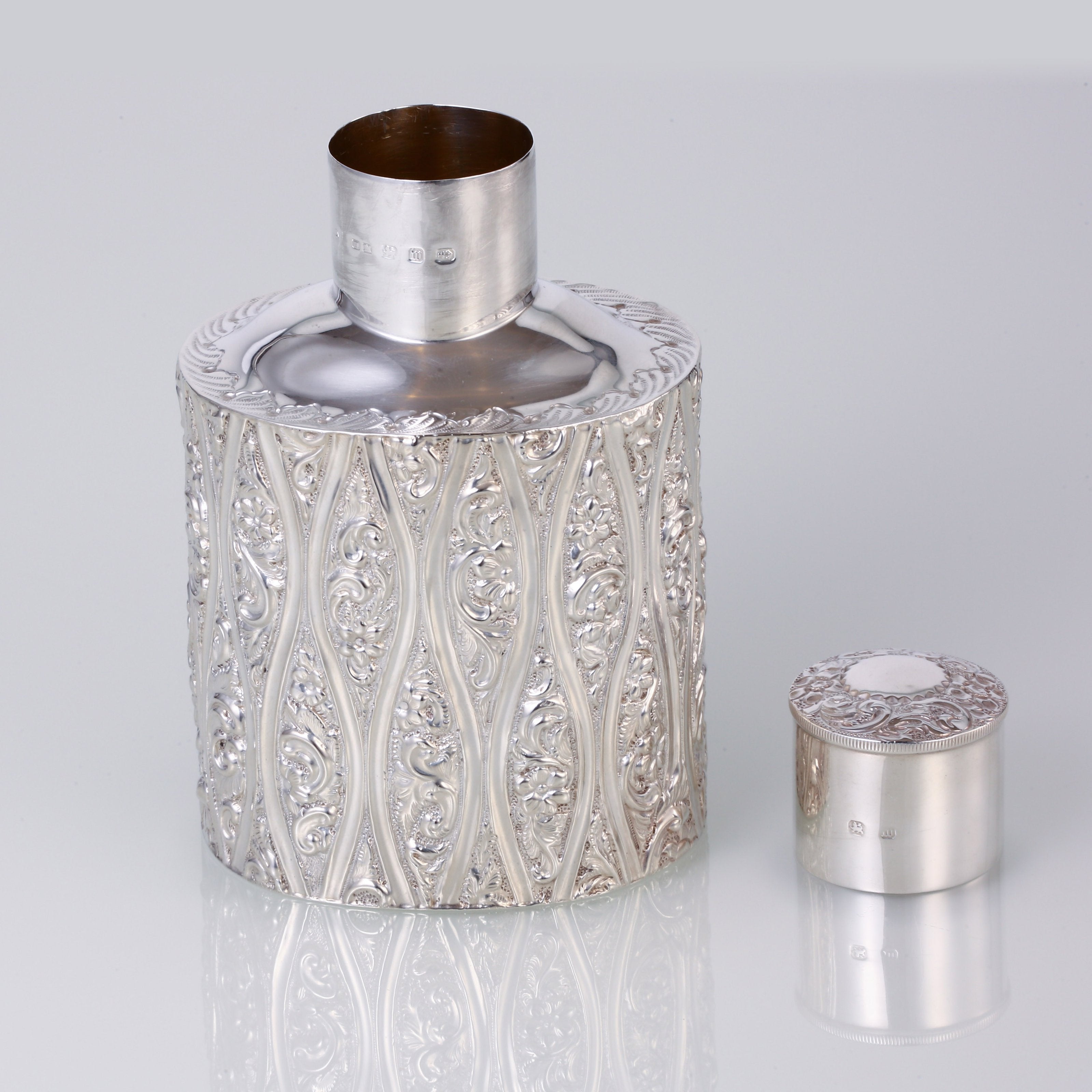 1896 British sterling silver embossed tea caddy