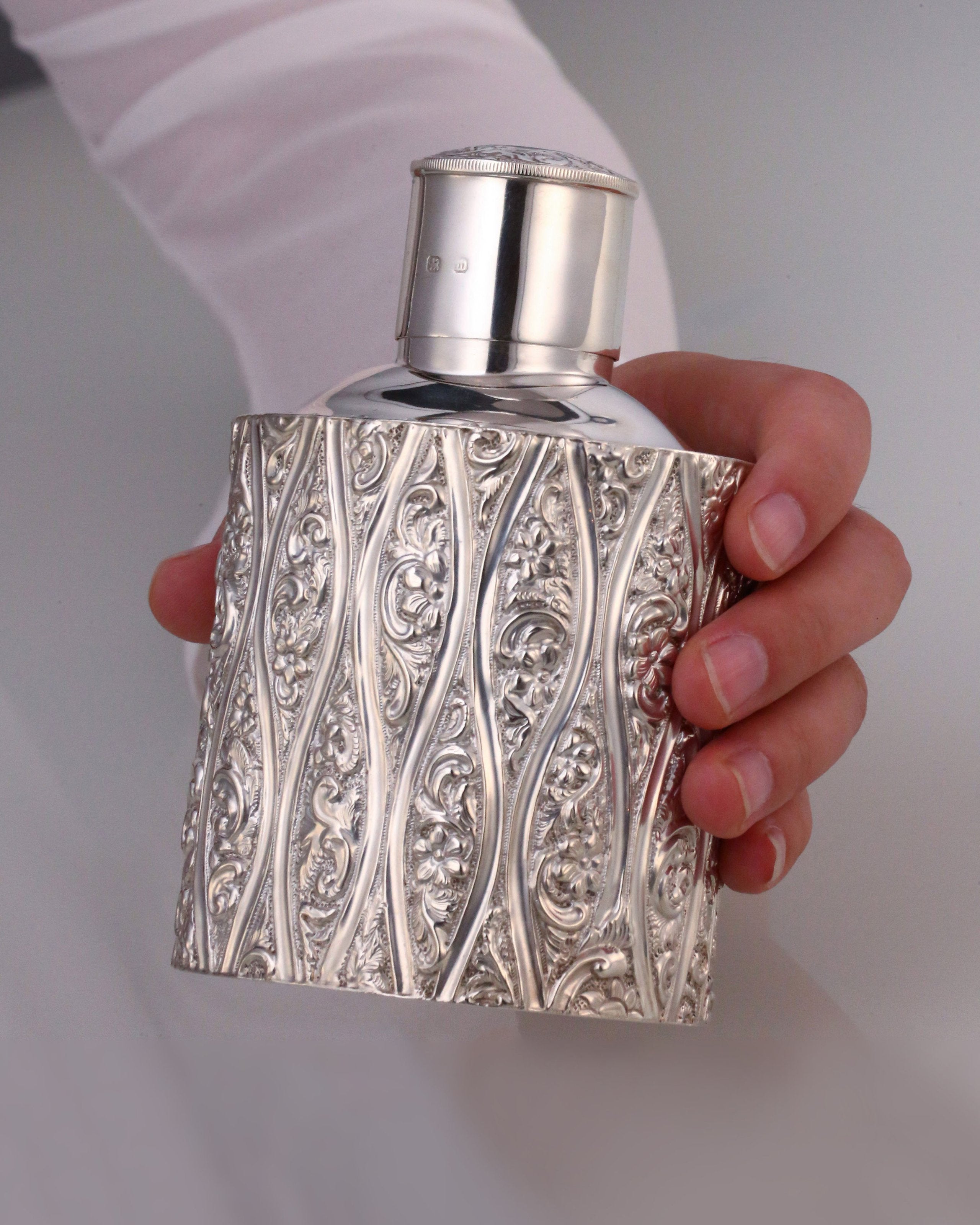 1896 British sterling silver embossed tea caddy