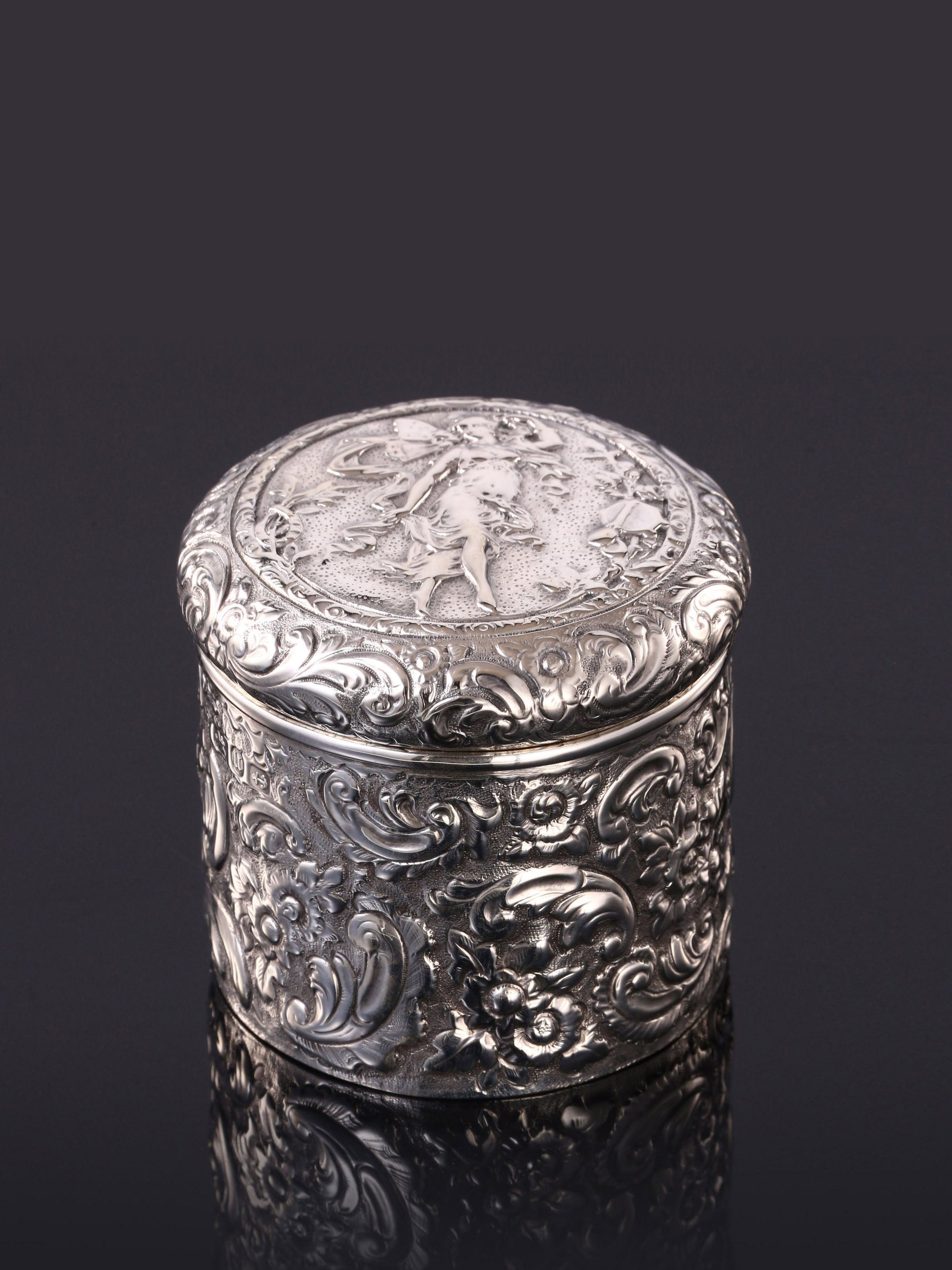 1894 British gilt-lined tea caddy with relief floral and figure design