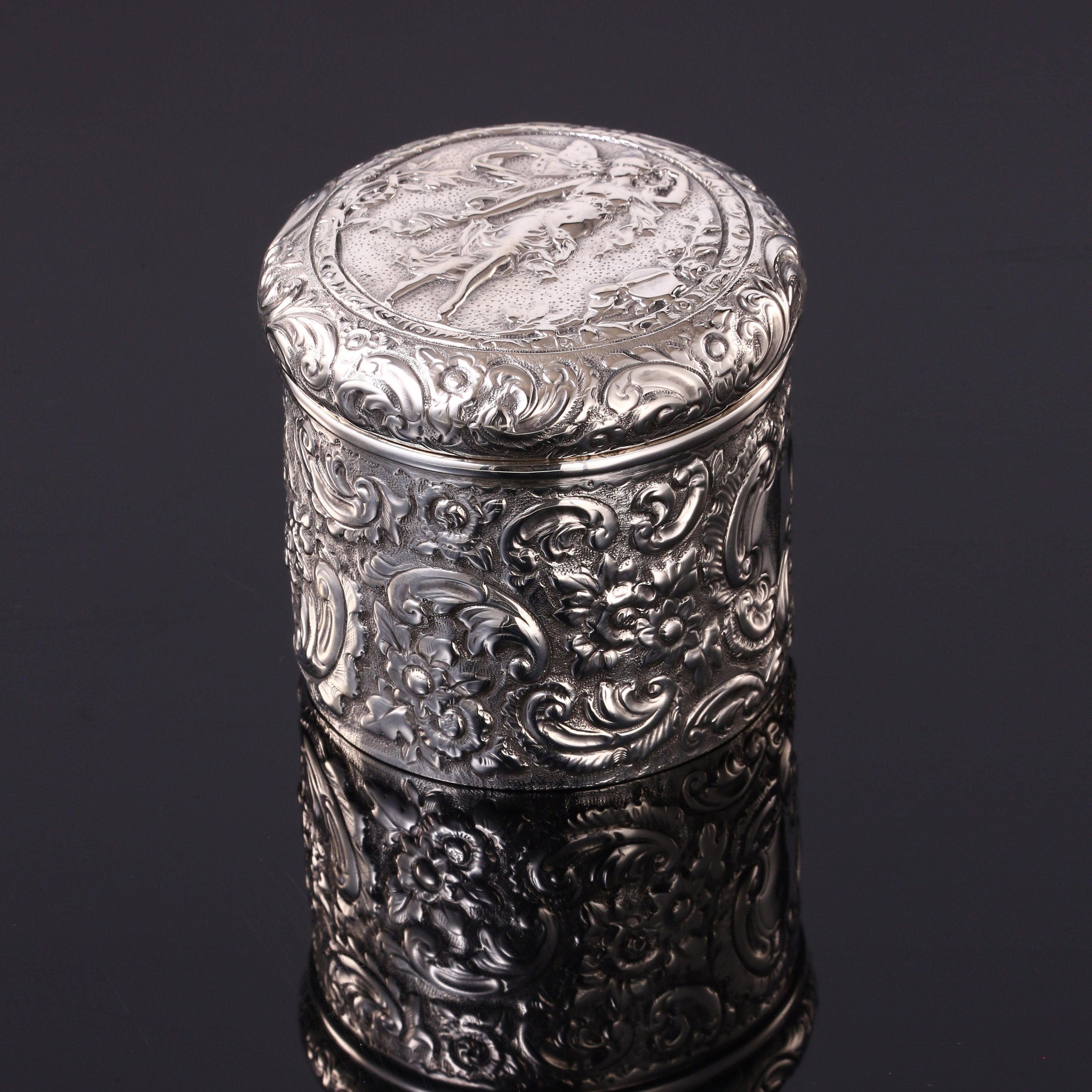 1894 British gilt-lined tea caddy with relief floral and figure design