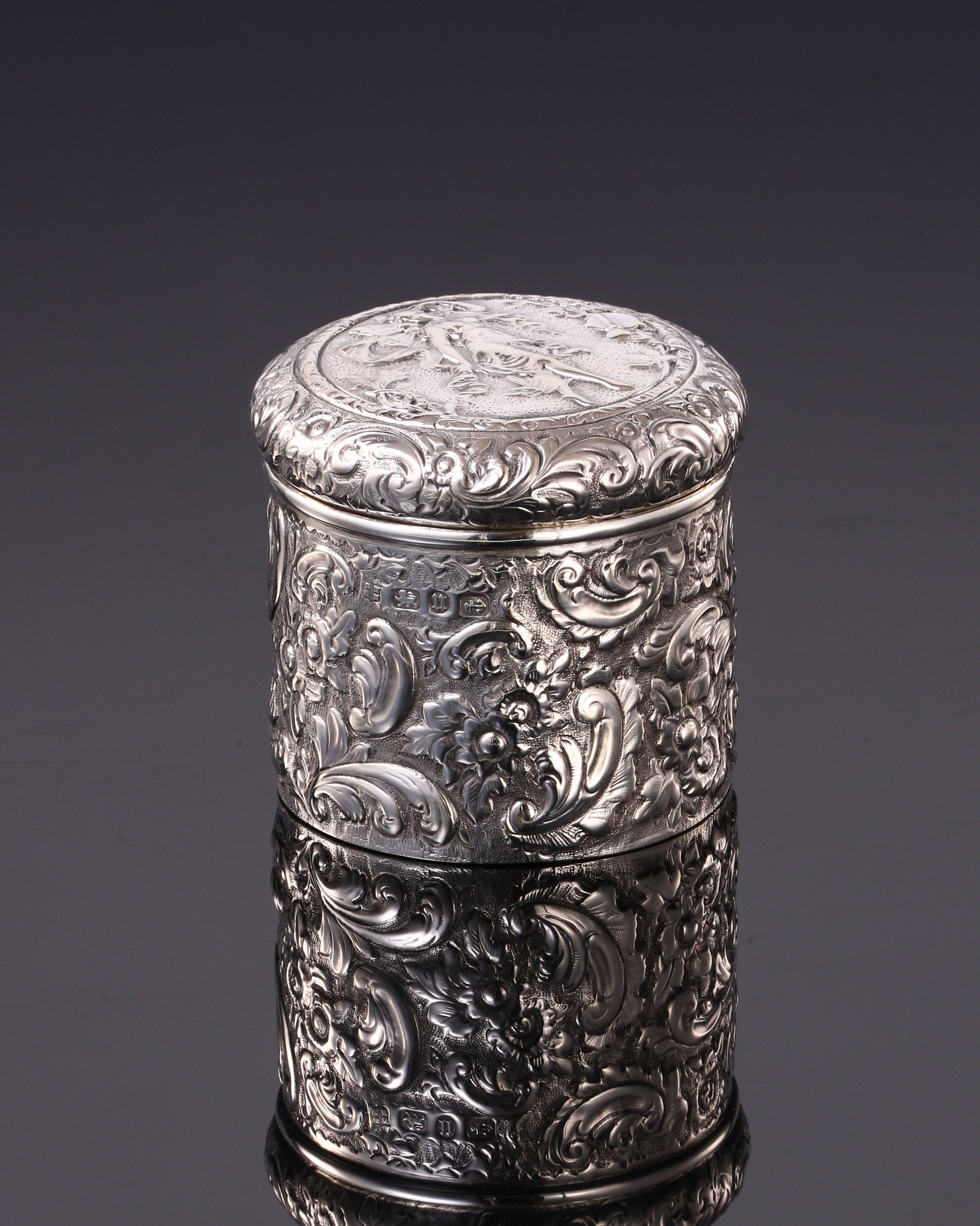 1894 British gilt-lined tea caddy with relief floral and figure design