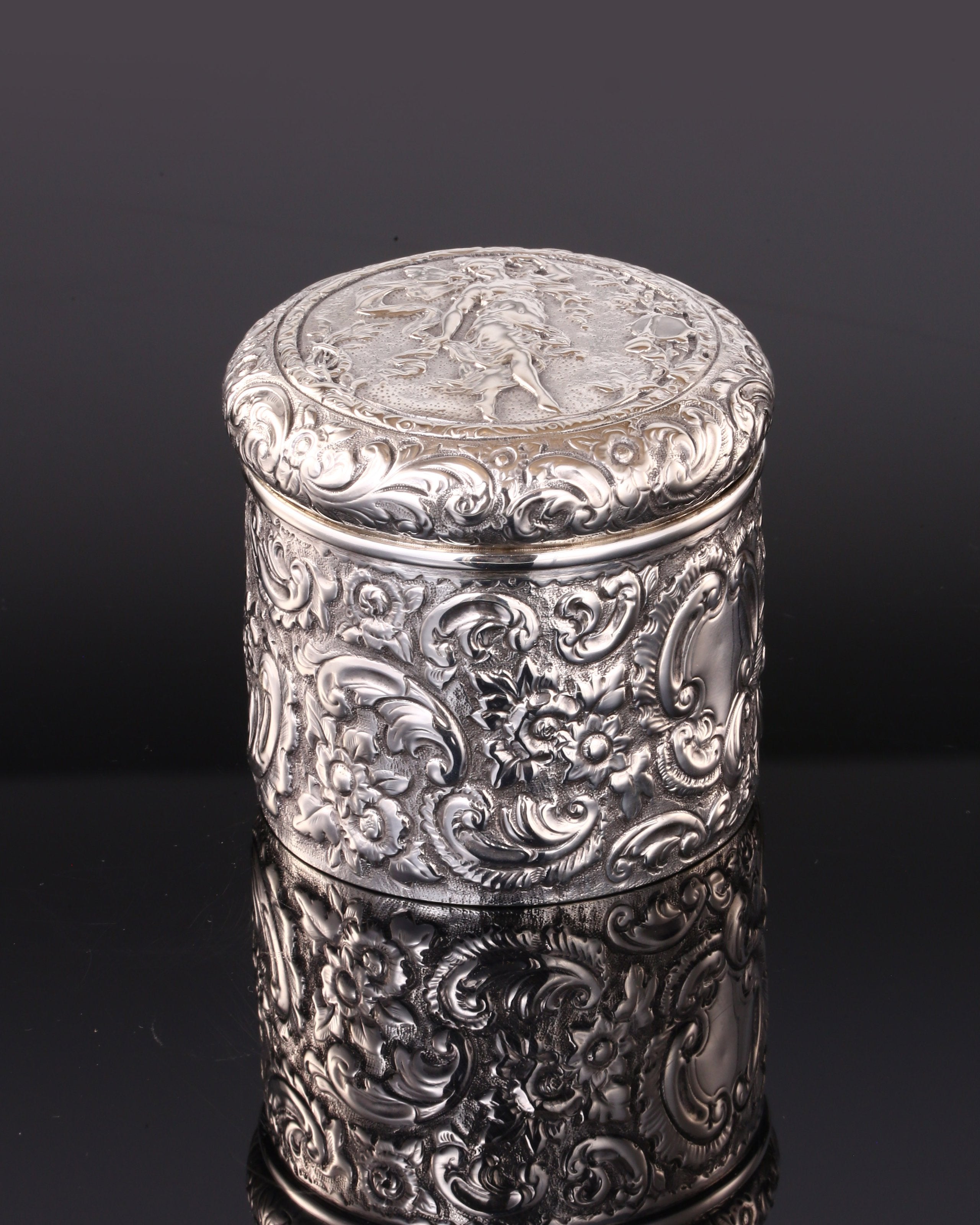 1894 British gilt-lined tea caddy with relief floral and figure design
