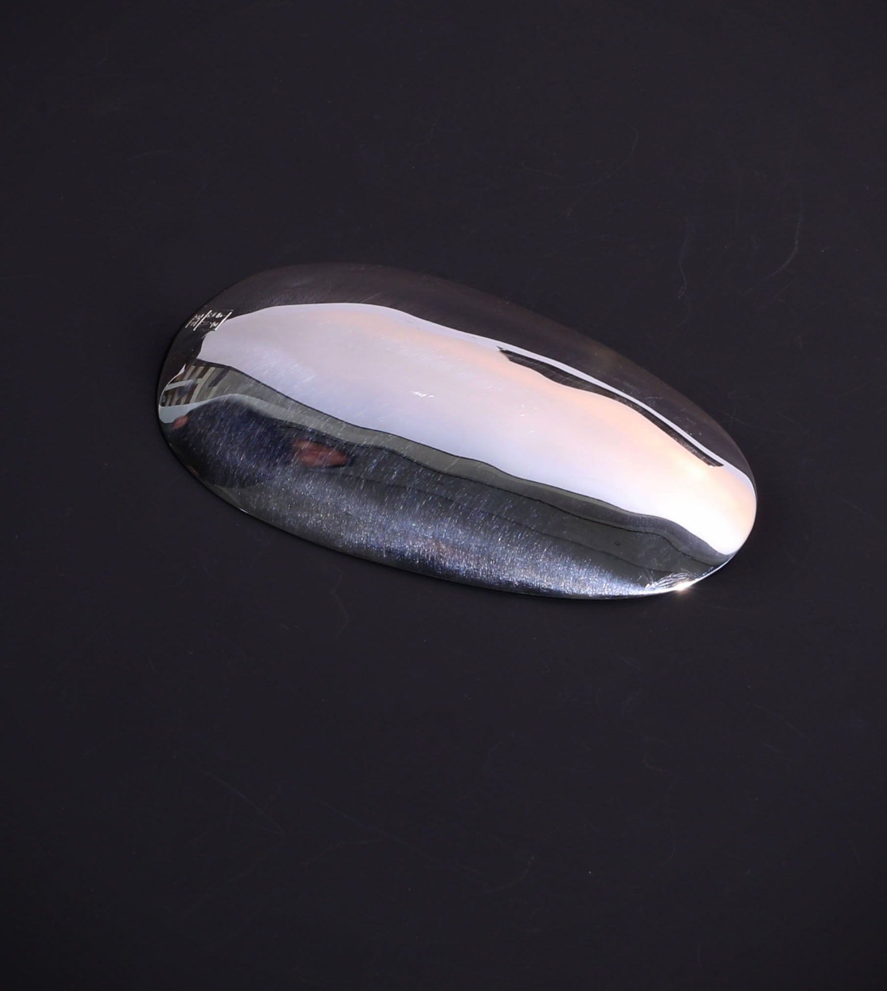 A piece of silver tea scoop