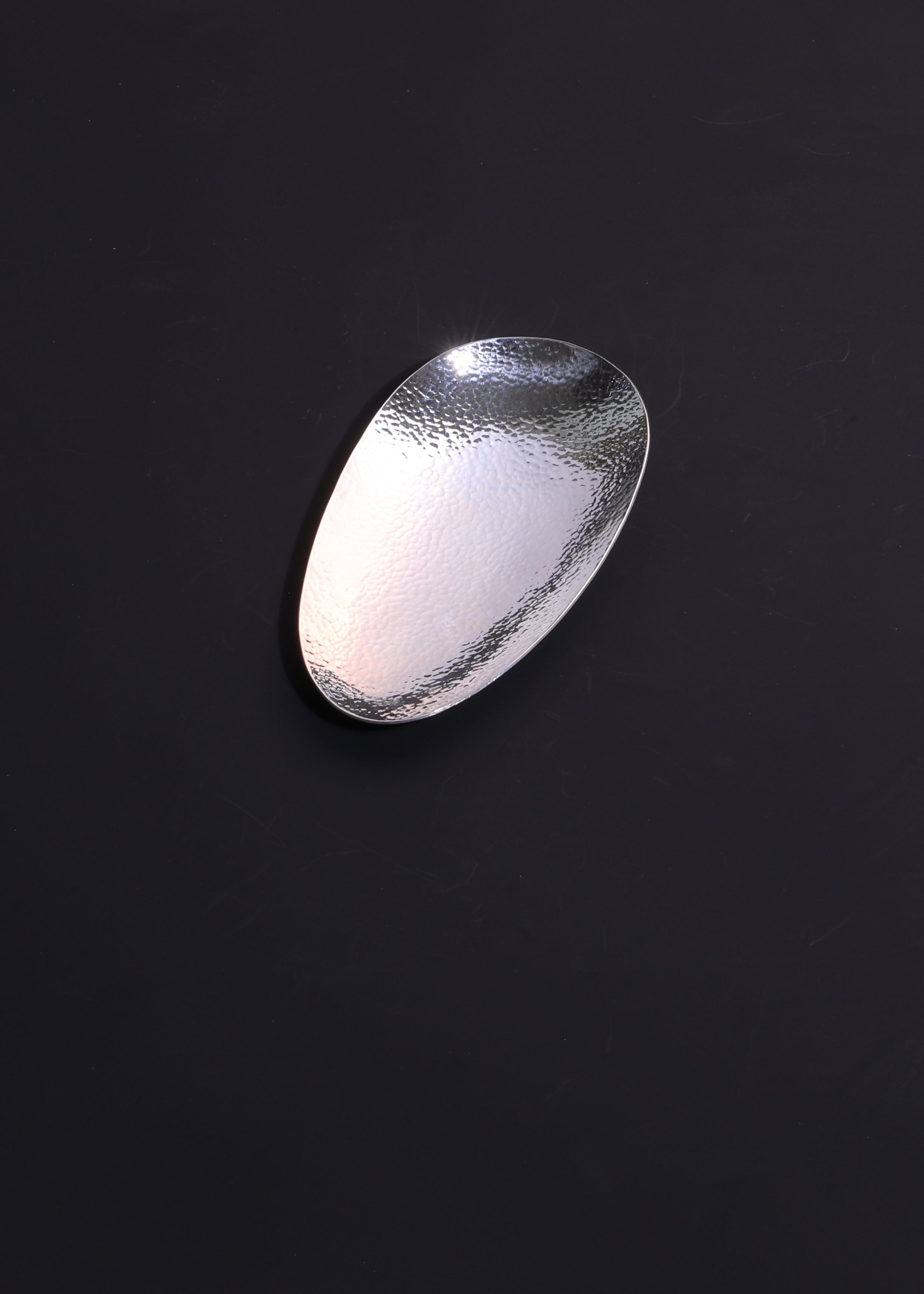 A piece of silver tea scoop